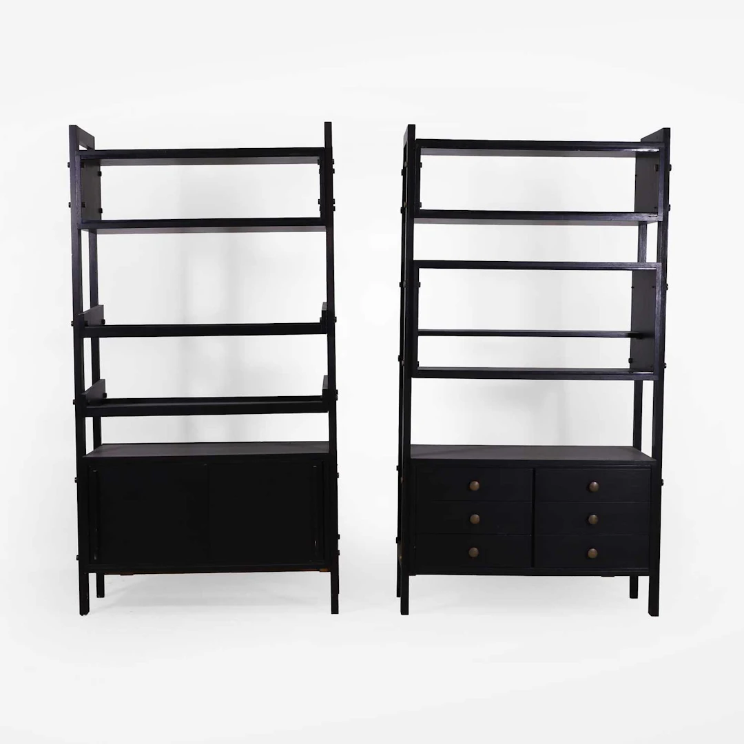 Italian a pair of ebonised étagères