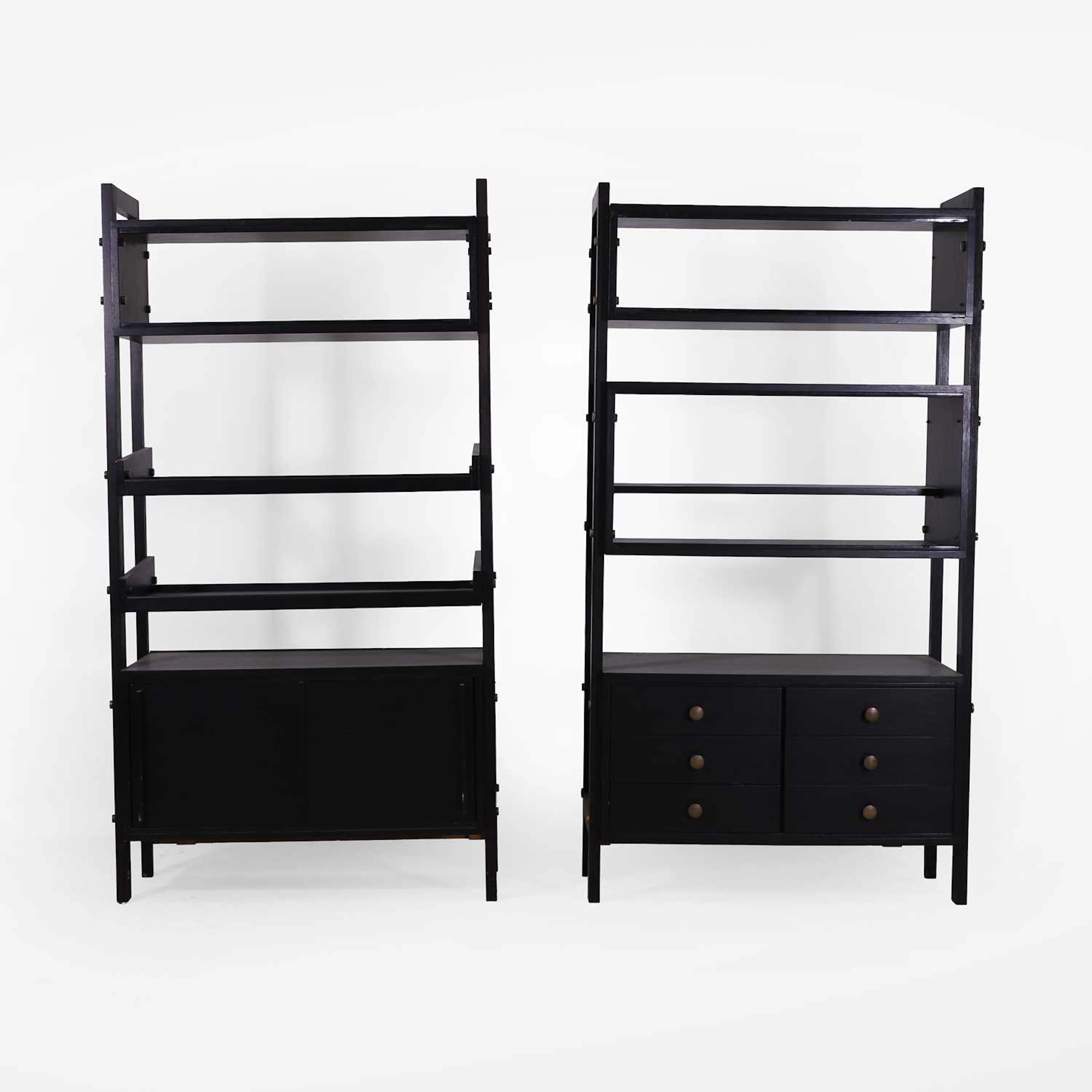 Italian a pair of ebonised étagères