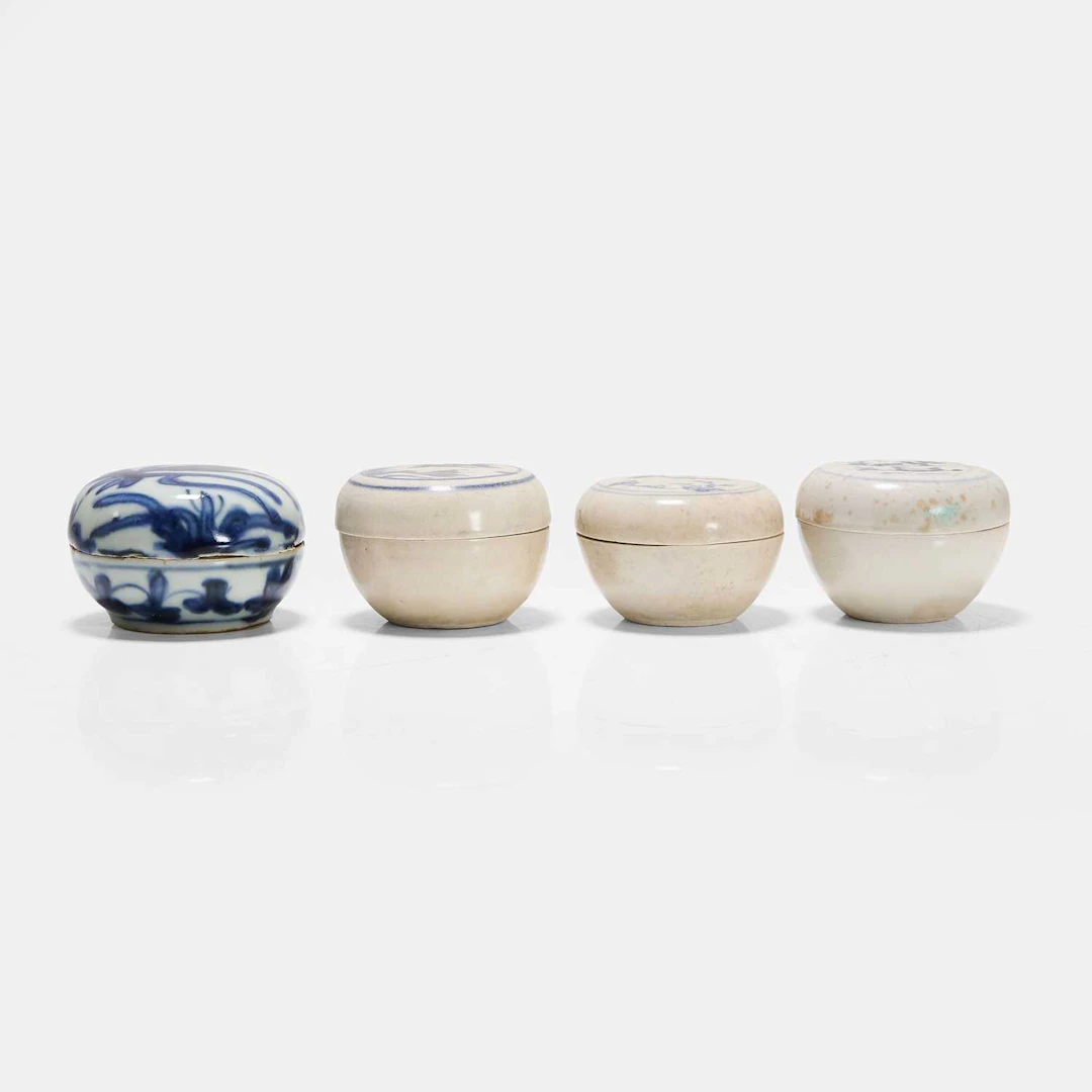 A collection of four Vietnamese blue and white boxes and covers 15th century