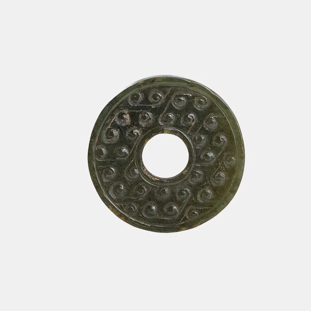 A Chinese jade bi disc Warring States period (475-221 BCE)