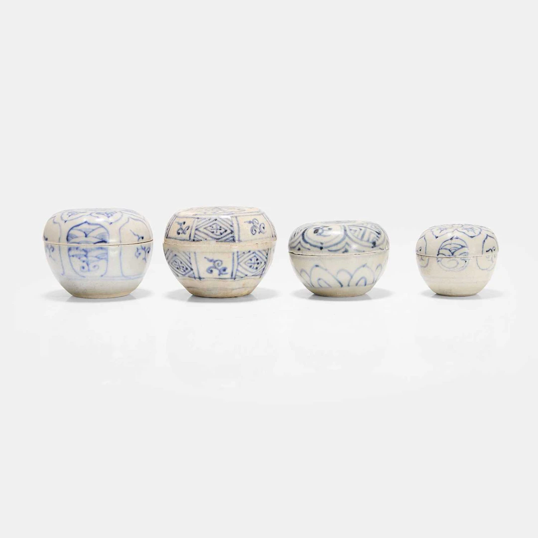 A collection of four Vietnamese blue and white boxes and covers 15th century