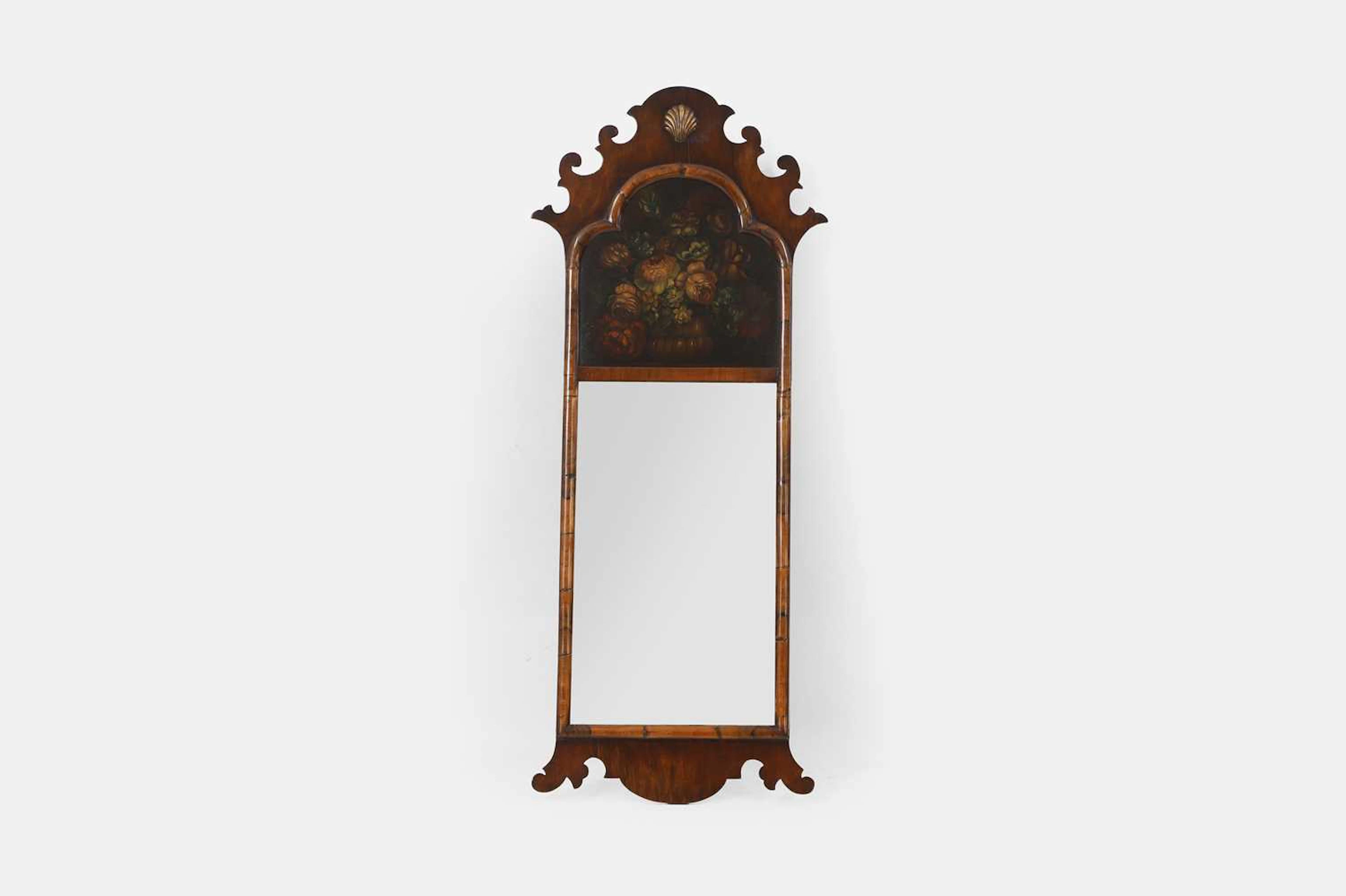 A Queen Anne-style walnut pier mirror 19th century