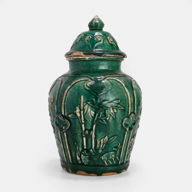 A Chinese Shiwan ware jar and cover 19th century