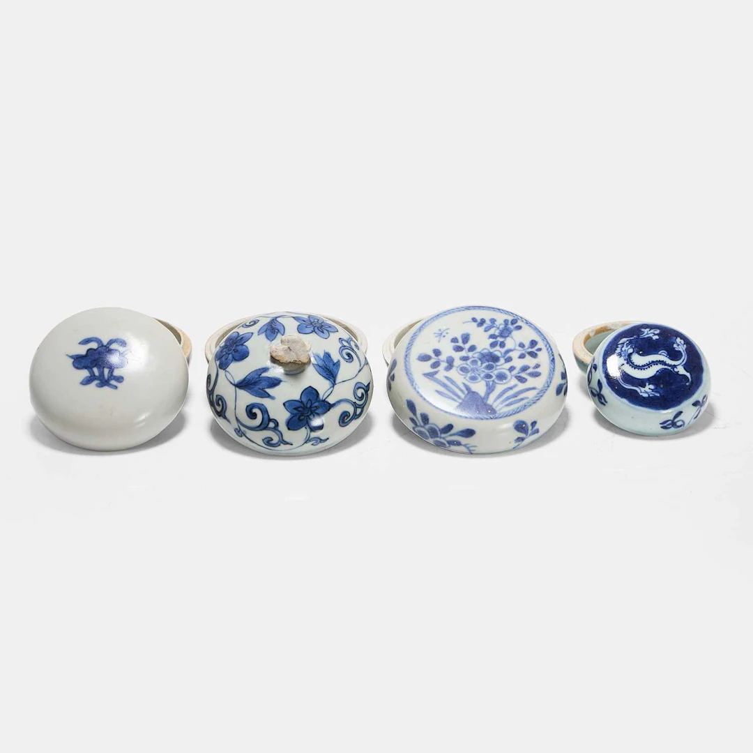A collection of four Chinese blue and white boxes and covers Ming