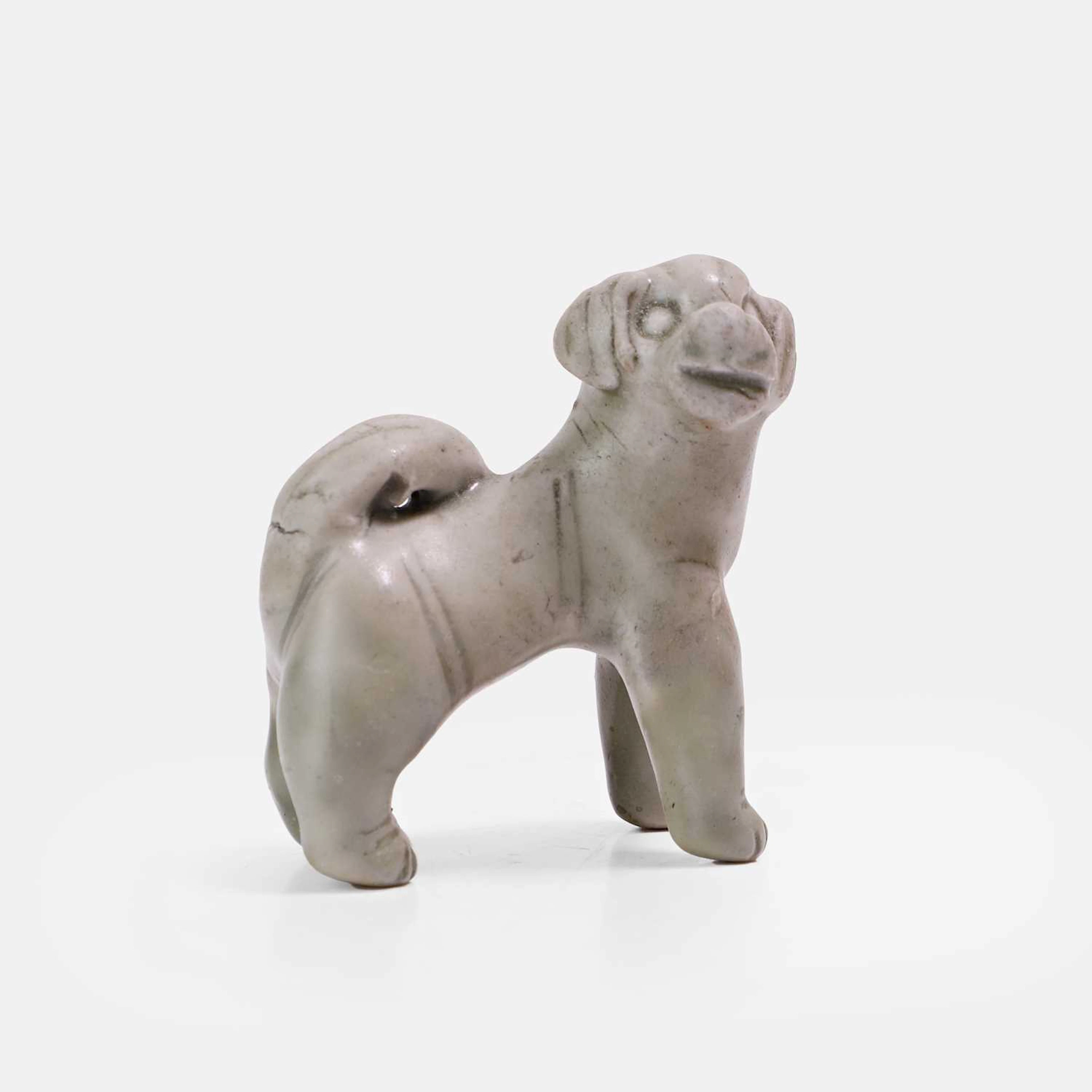 A Chinese celadon-glazed figure Song dynasty (960-1279)