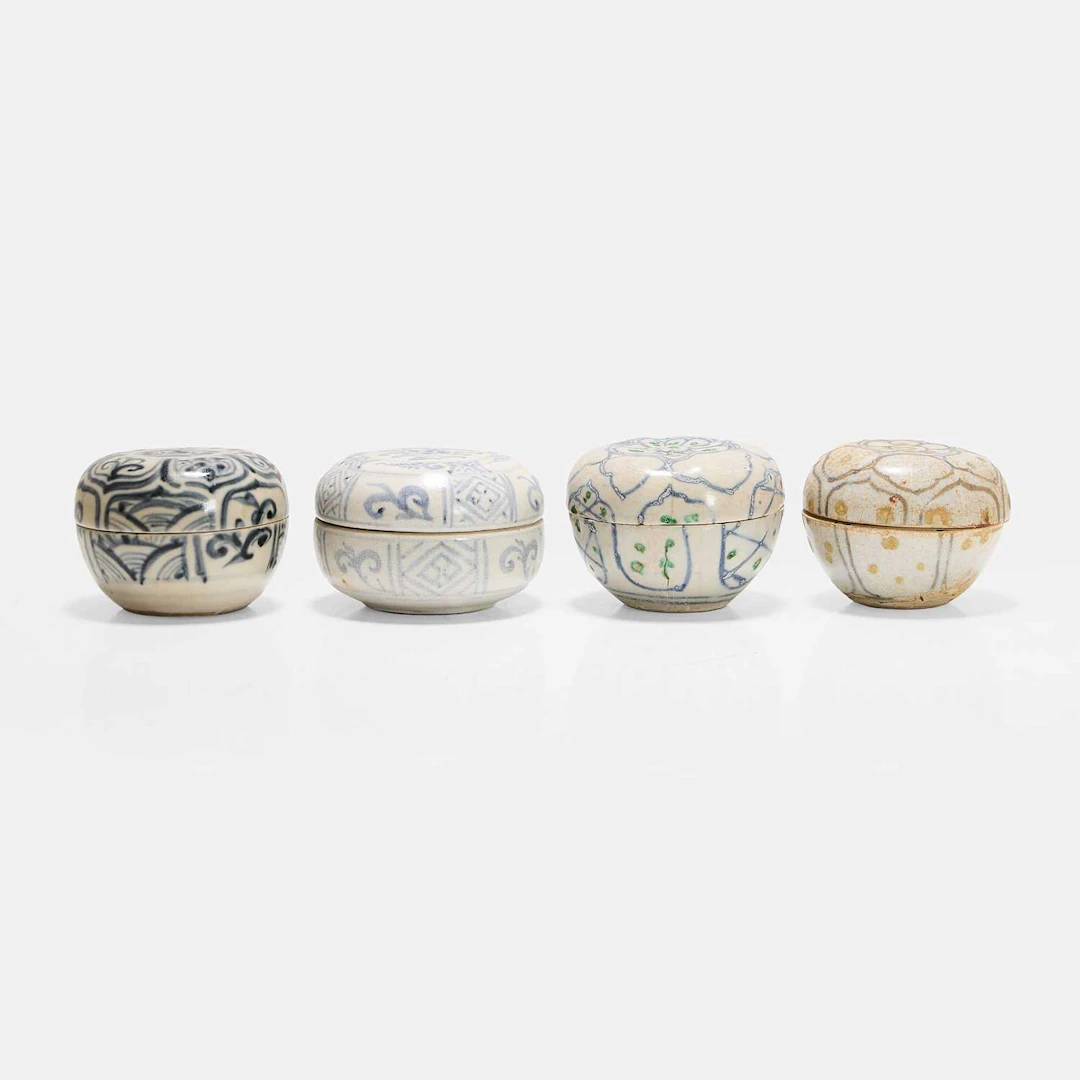 A collection of four Vietnamese blue and white boxes and covers 15th century