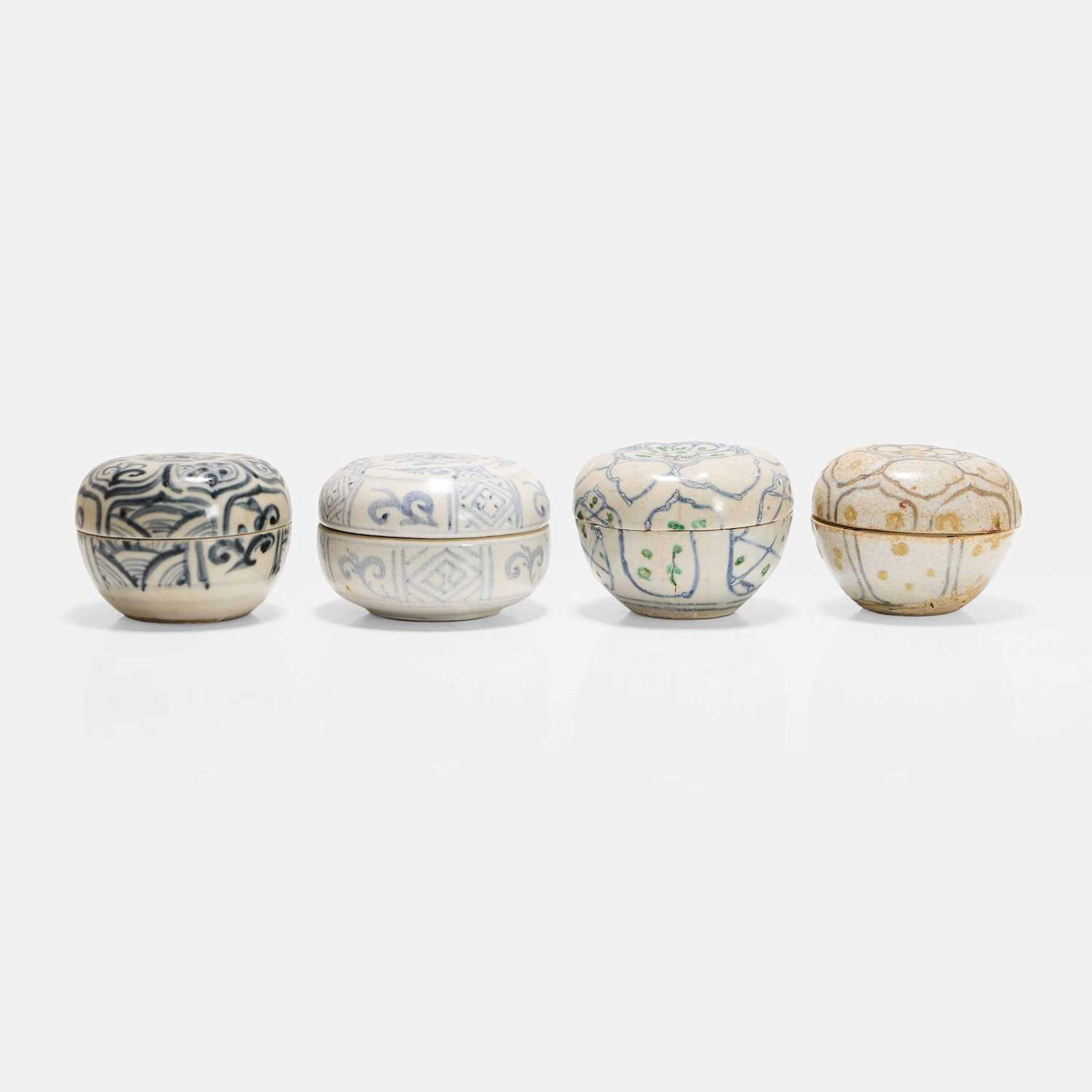 A collection of four Vietnamese blue and white boxes and covers 15th century
