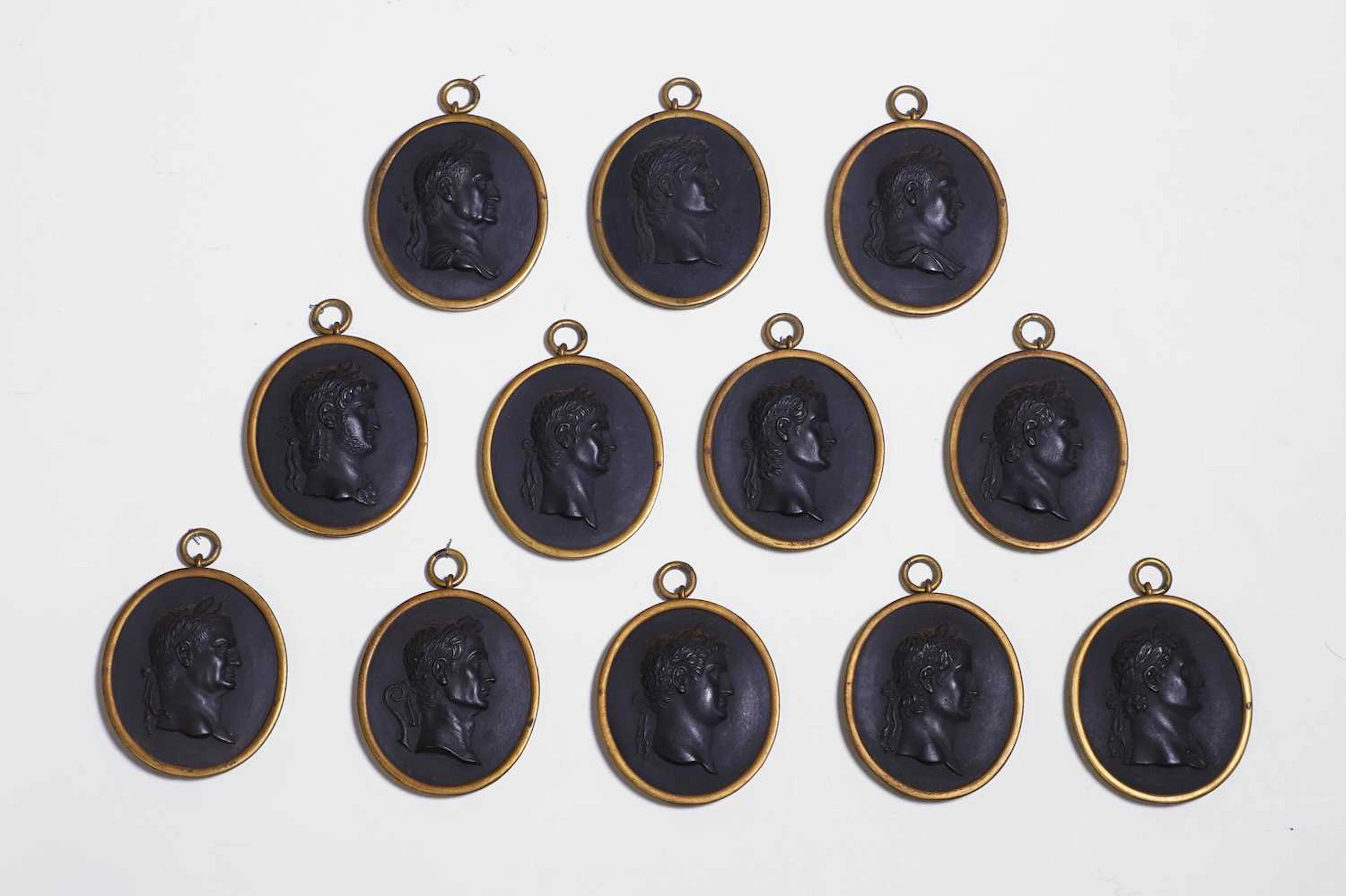 A set of twelve Wedgwood black basalt medallions