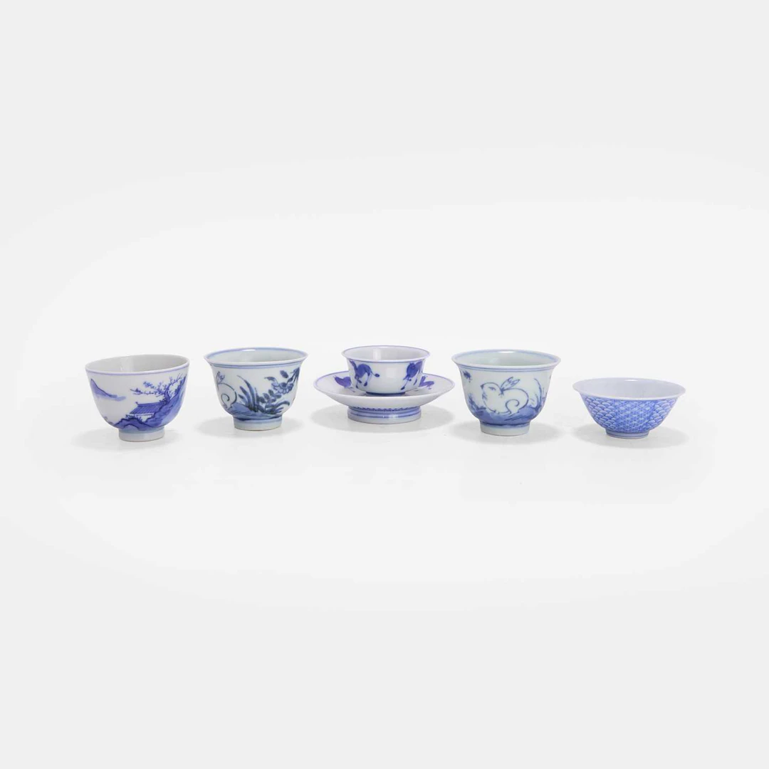 A collection of Japanese blue and white cups 19th-20th century