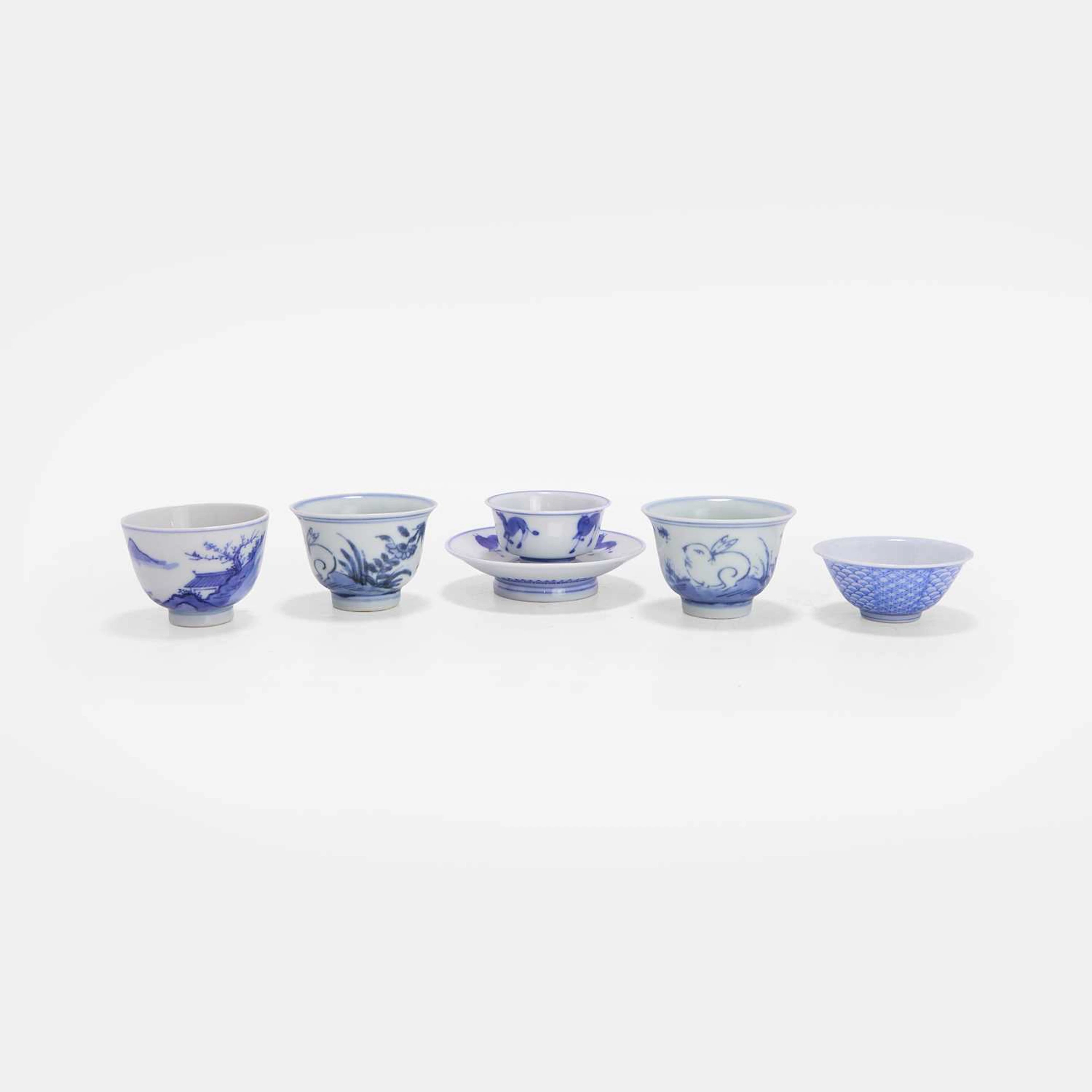 A collection of Japanese blue and white cups 19th-20th century