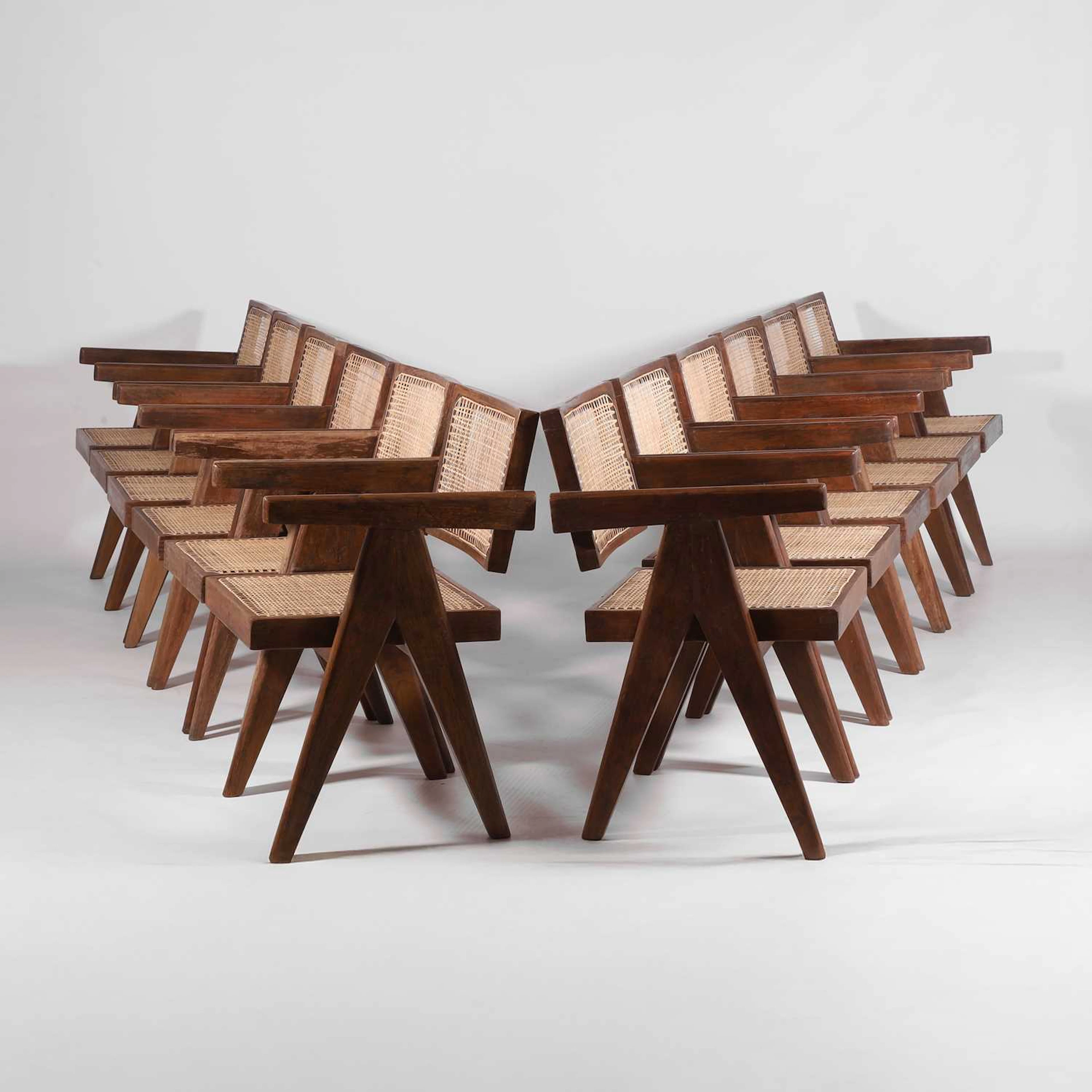 Pierre Jeanneret (Swiss, 1896-1967) A set of twelve chairs
