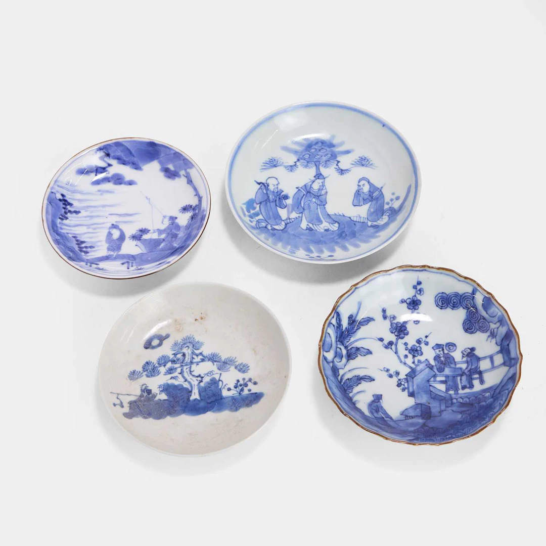 A collection of four Japanese blue and white saucers 18th-19th century