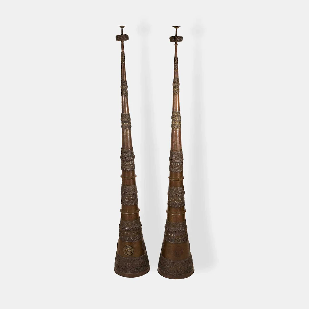 A pair of Tibetan copper and brass dungchen horns 20th century