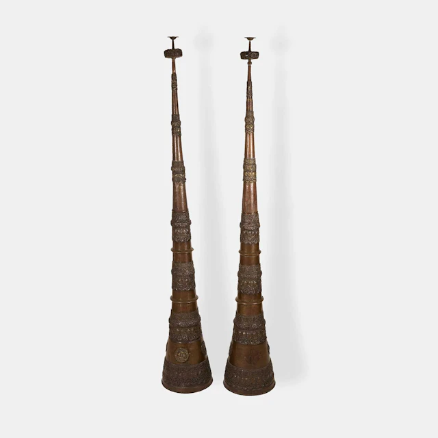 A pair of Tibetan copper and brass dungchen horns 20th century