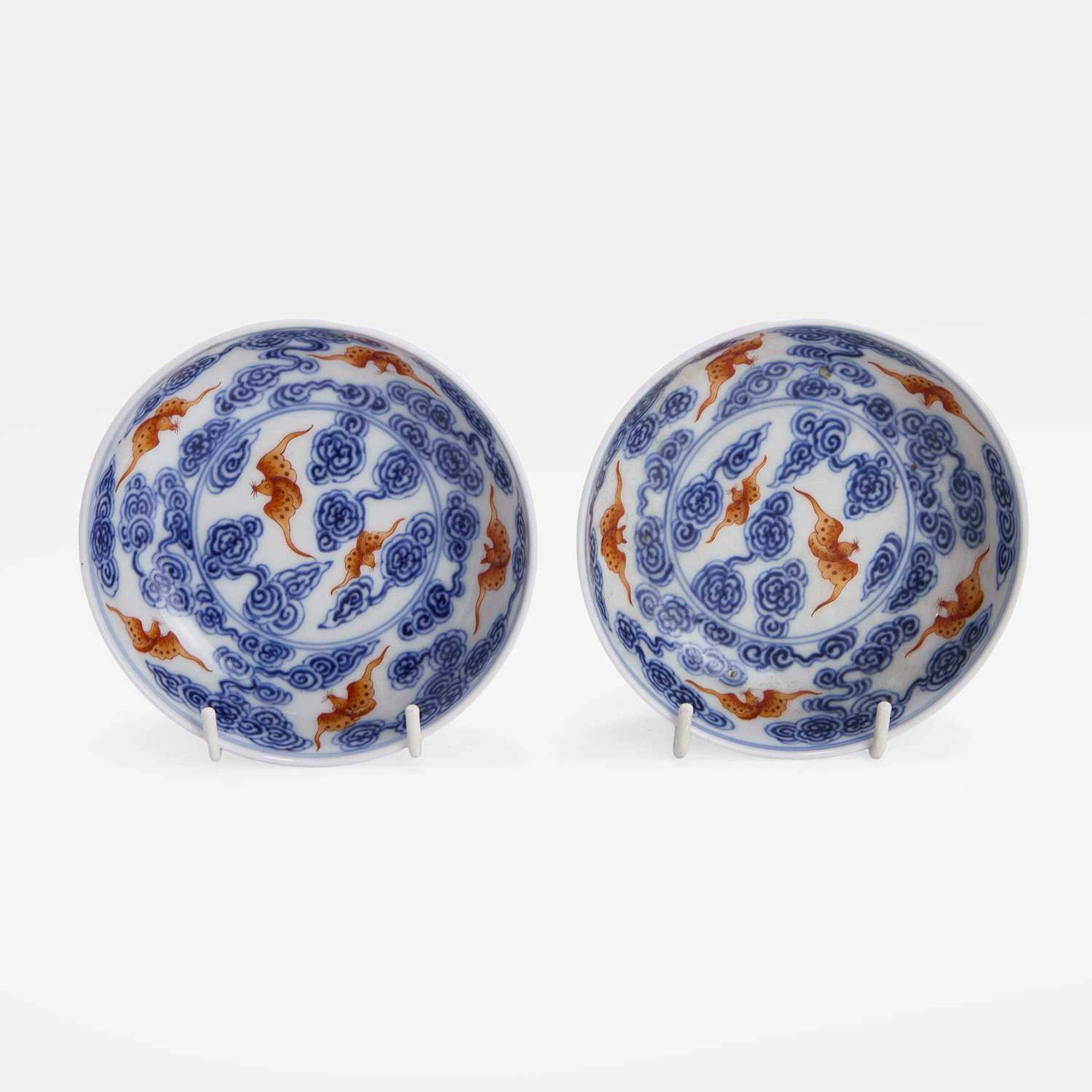 A pair of Chinese iron-red and underglaze-blue saucers Guangxu (1875-1908)
