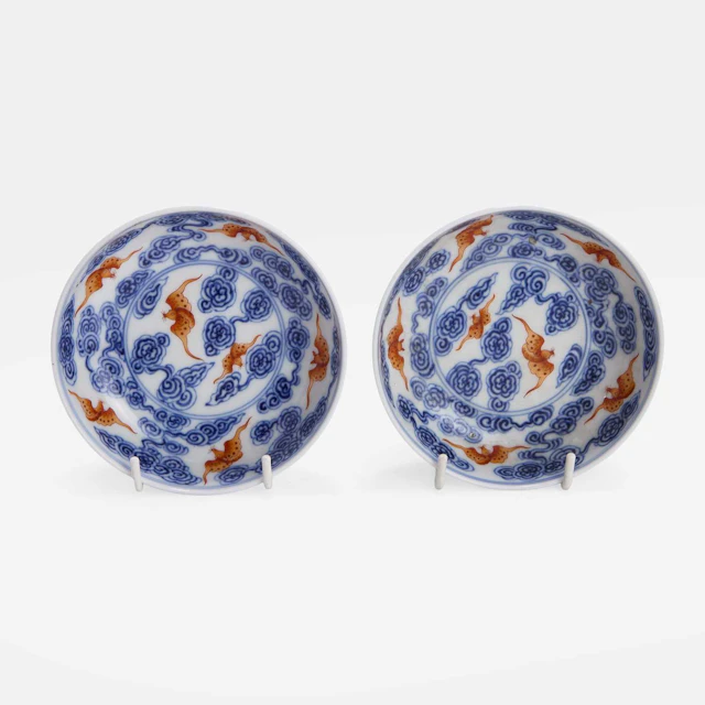 A pair of Chinese iron-red and underglaze-blue saucers Guangxu (1875-1908)