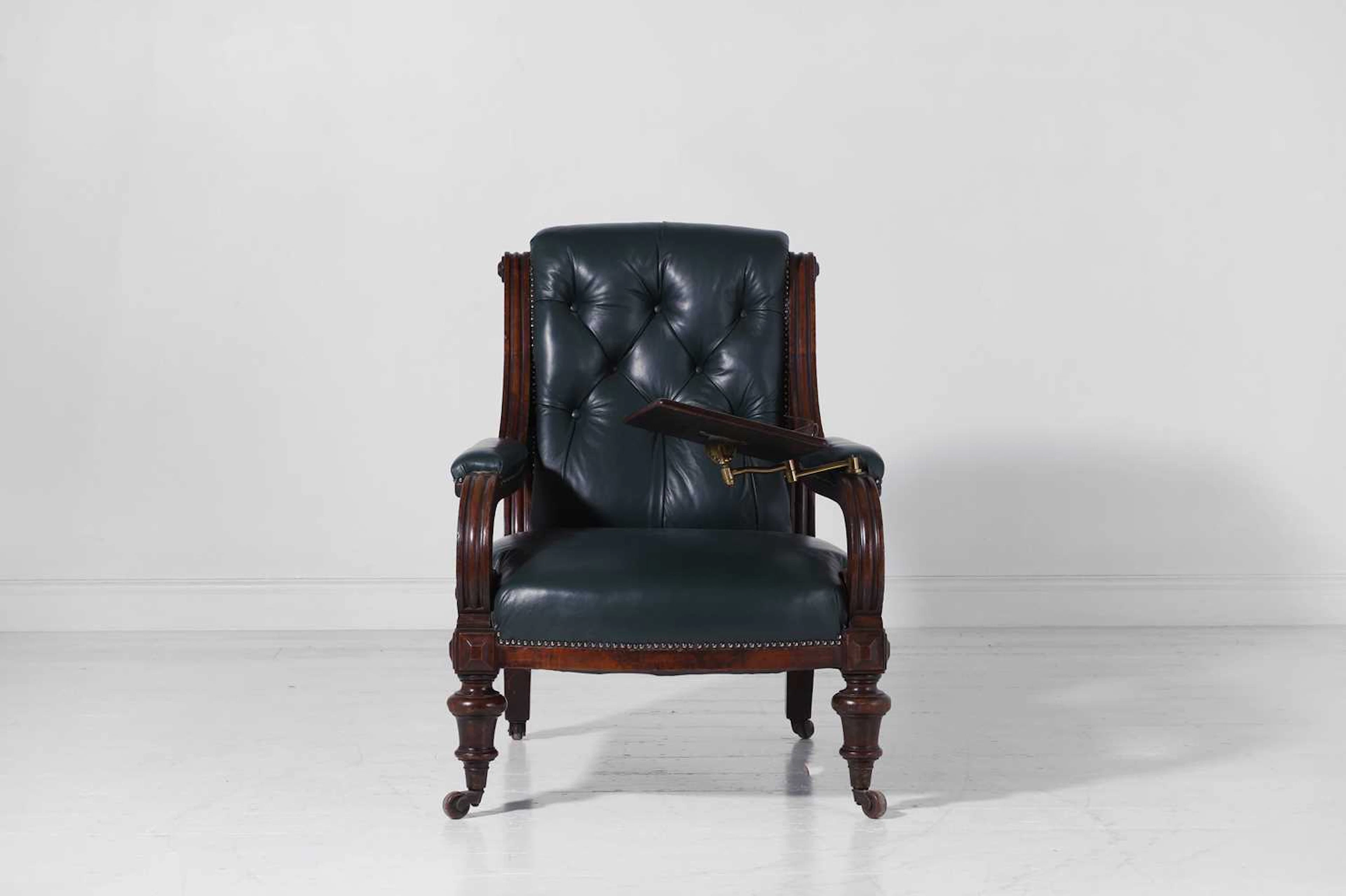 A Victorian walnut library armchair
