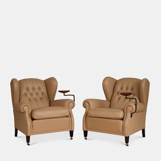 Poltrona Frau a pair of '1919' armchairs