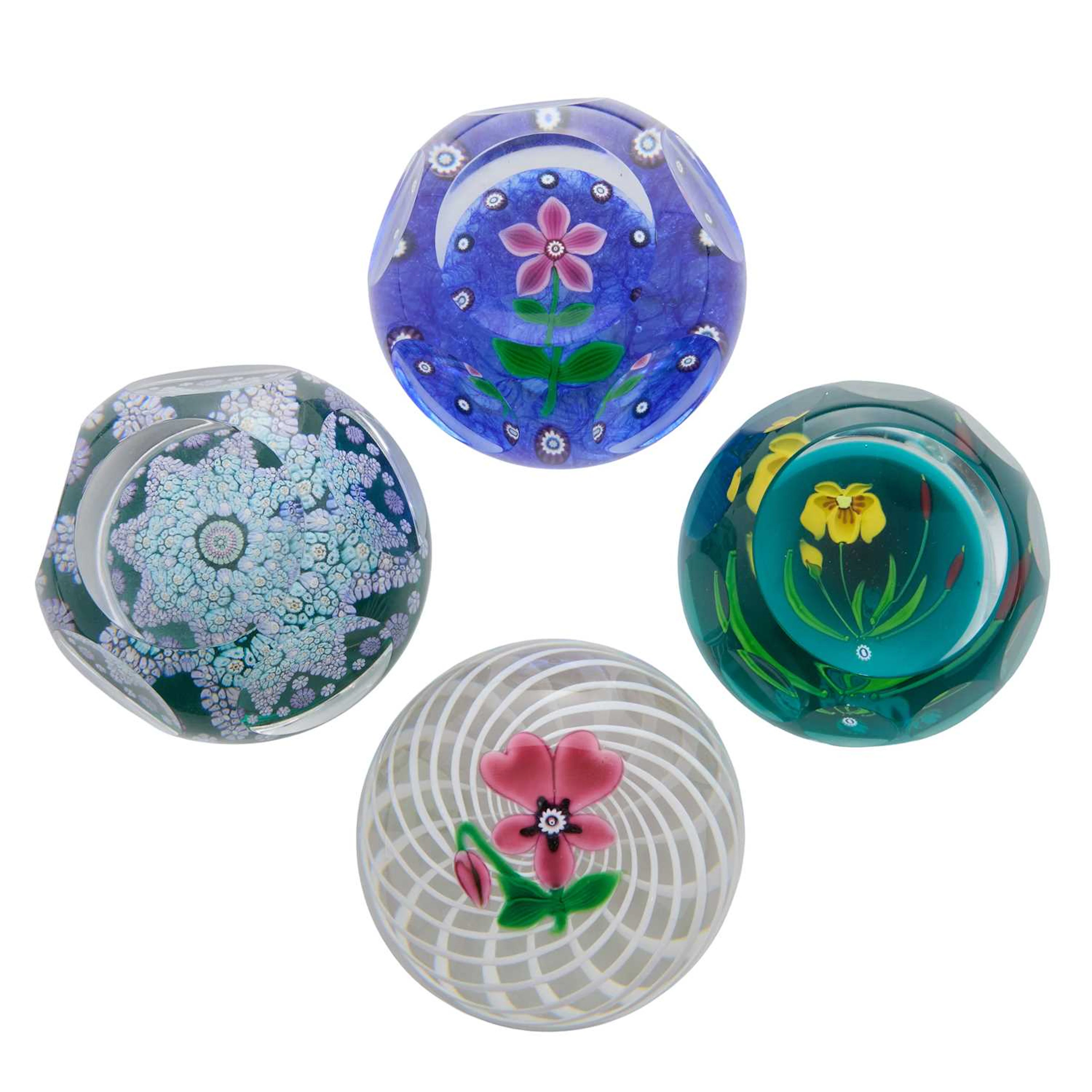 A group of four glass paperweights 1979 and later