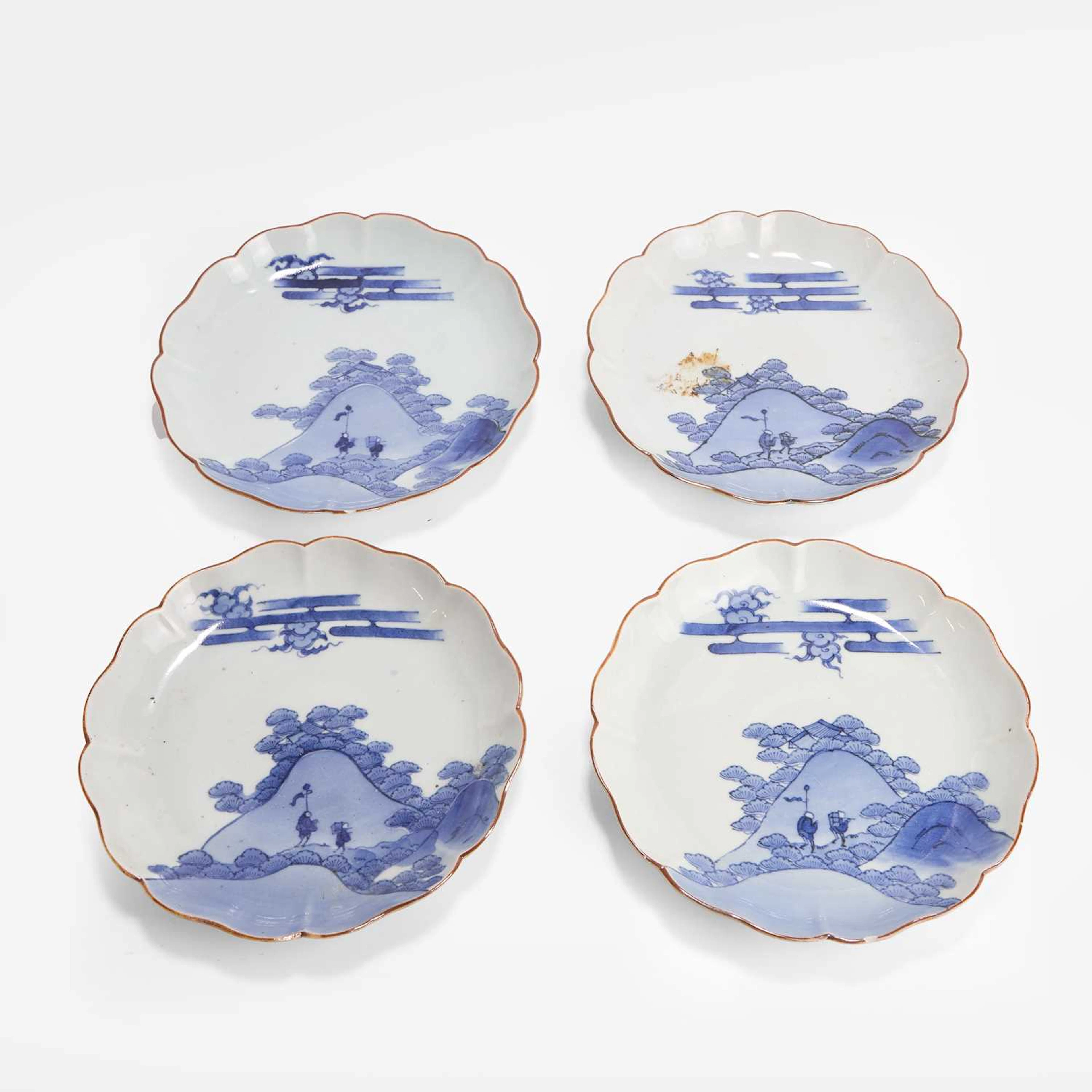 A group of four Japanese Arita blue and white dishes 18th century