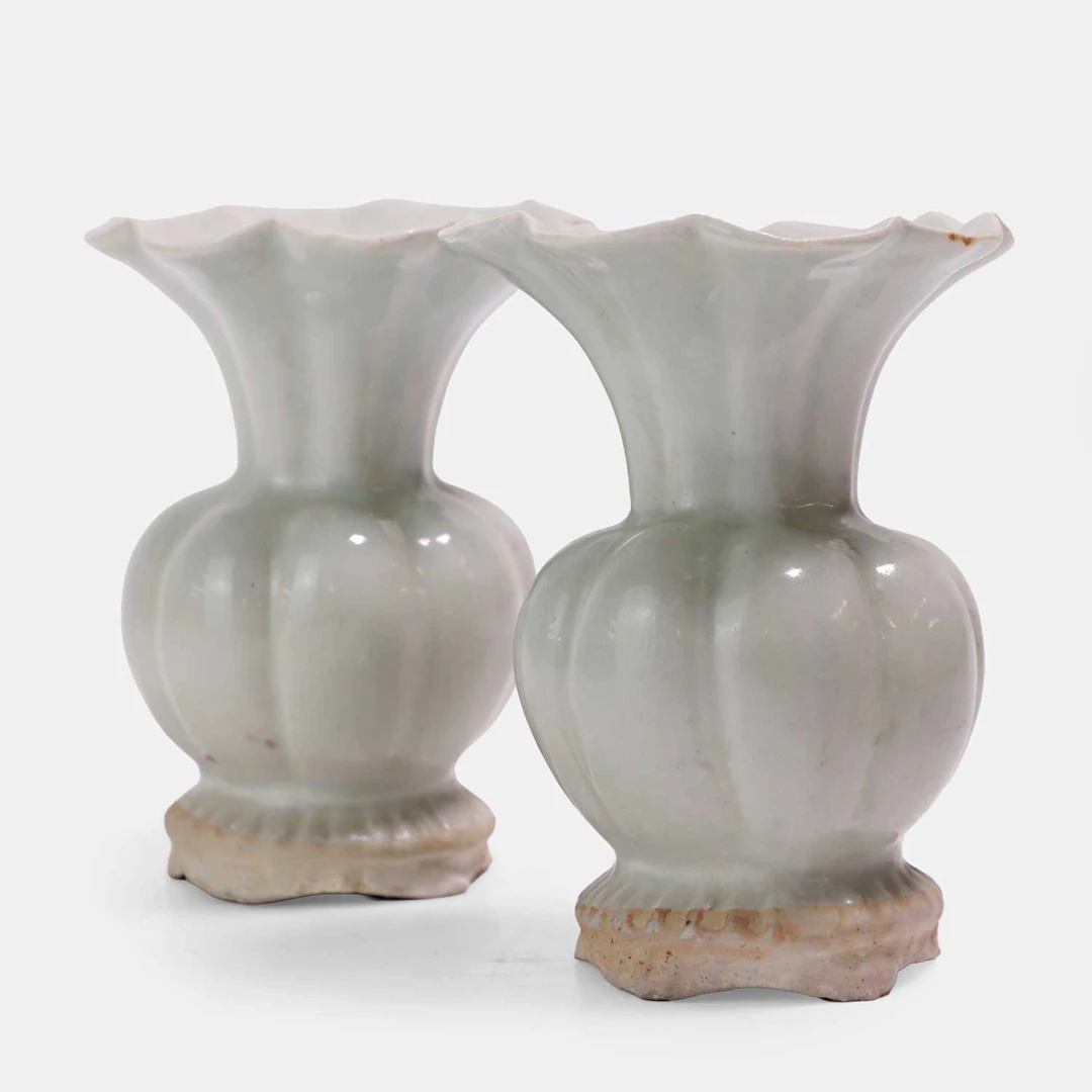 A pair of Chinese qingbai-glazed vases Yuan dynasty (1271-1368)