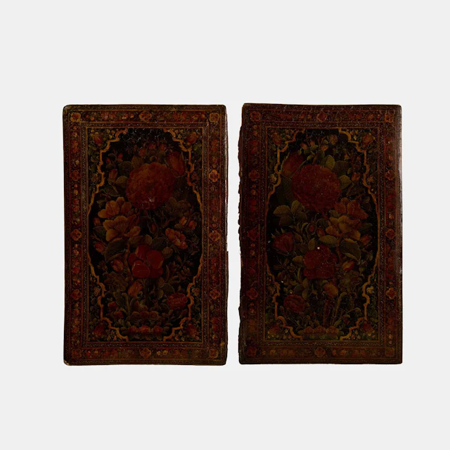 A pair of Qajar papier mâché lacquered book covers 19th century, Iran