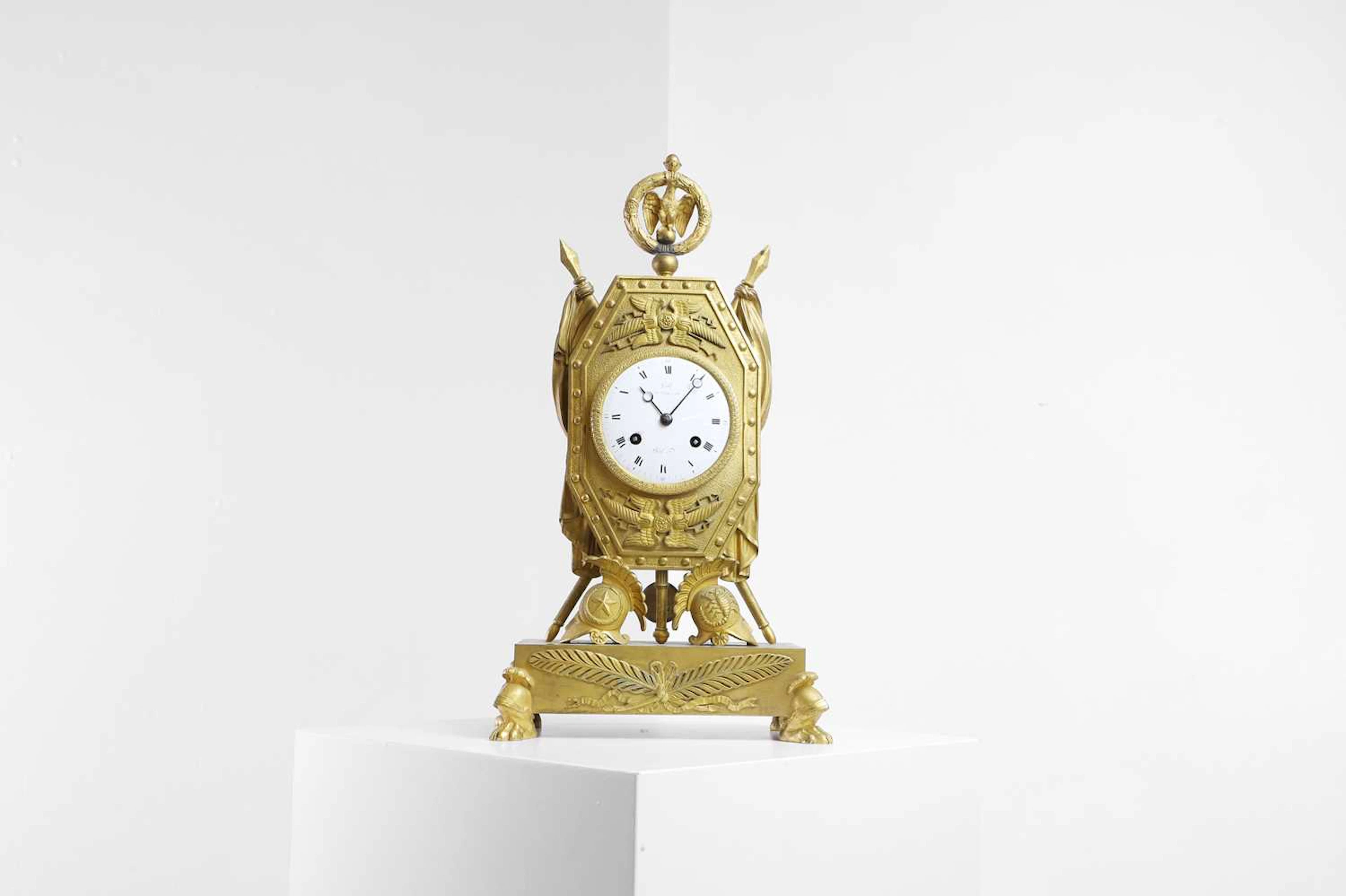 An Empire ormolu mantel clock