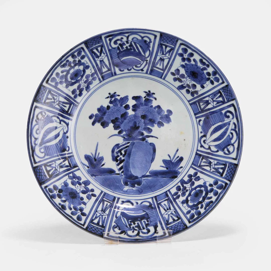 A Japanese Arita Kraak-type blue and white charger circa 1680