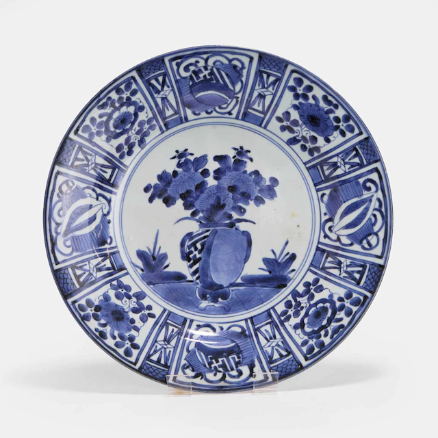A Japanese Arita Kraak-type blue and white charger circa 1680
