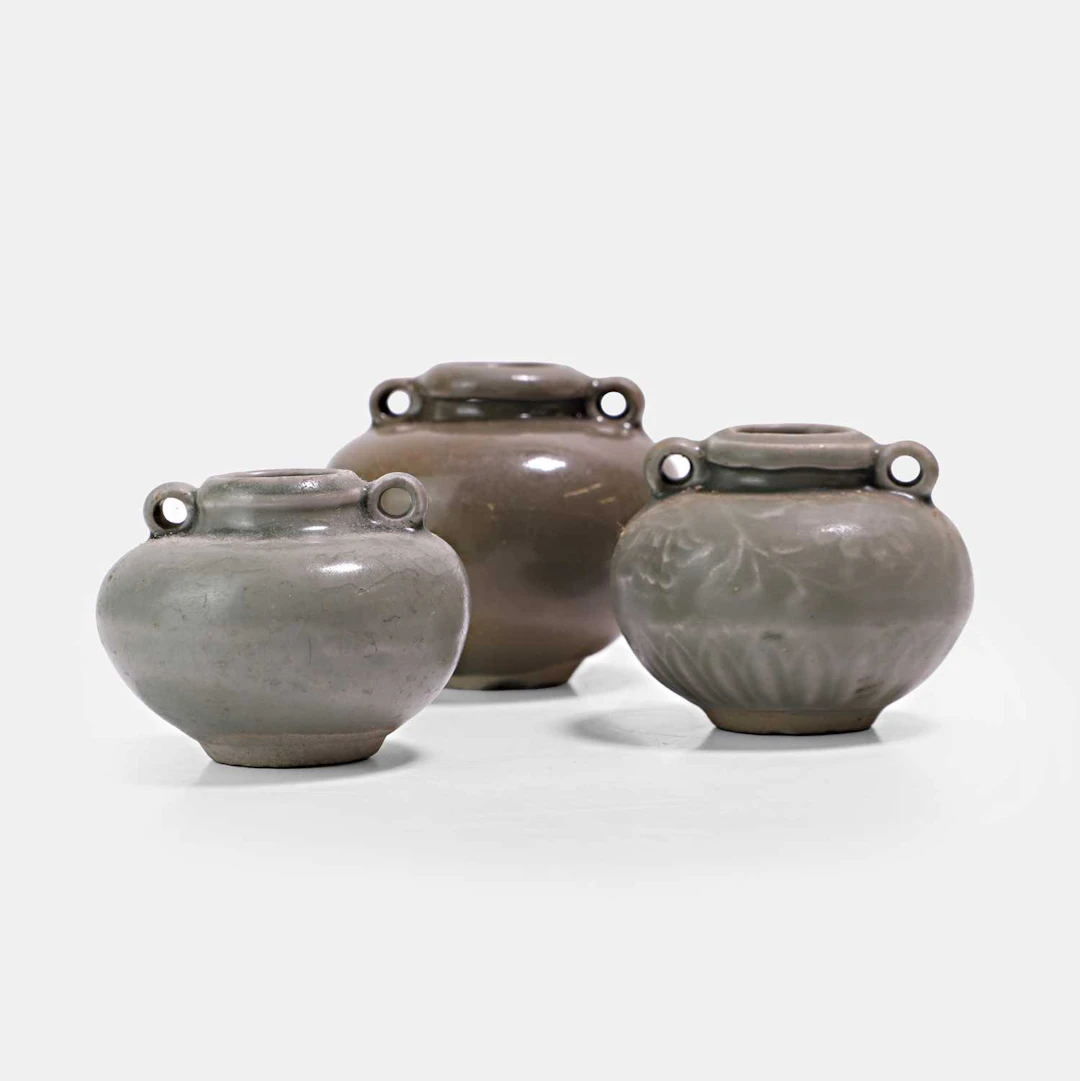 Three Chinese celadon-glazed jarlets Yuan dynasty (1271-1368)