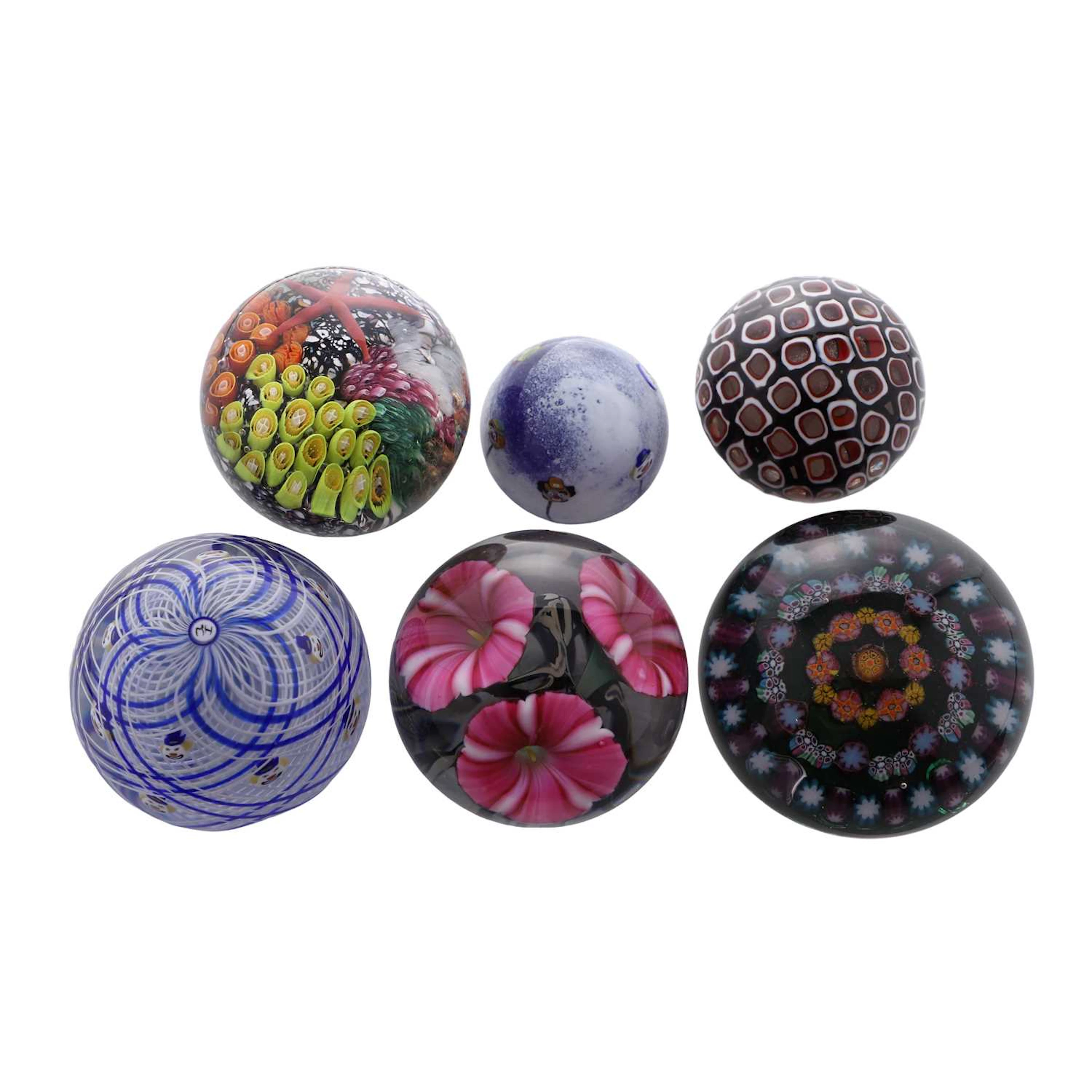 A collection of six glass paperweights late 20th century and later