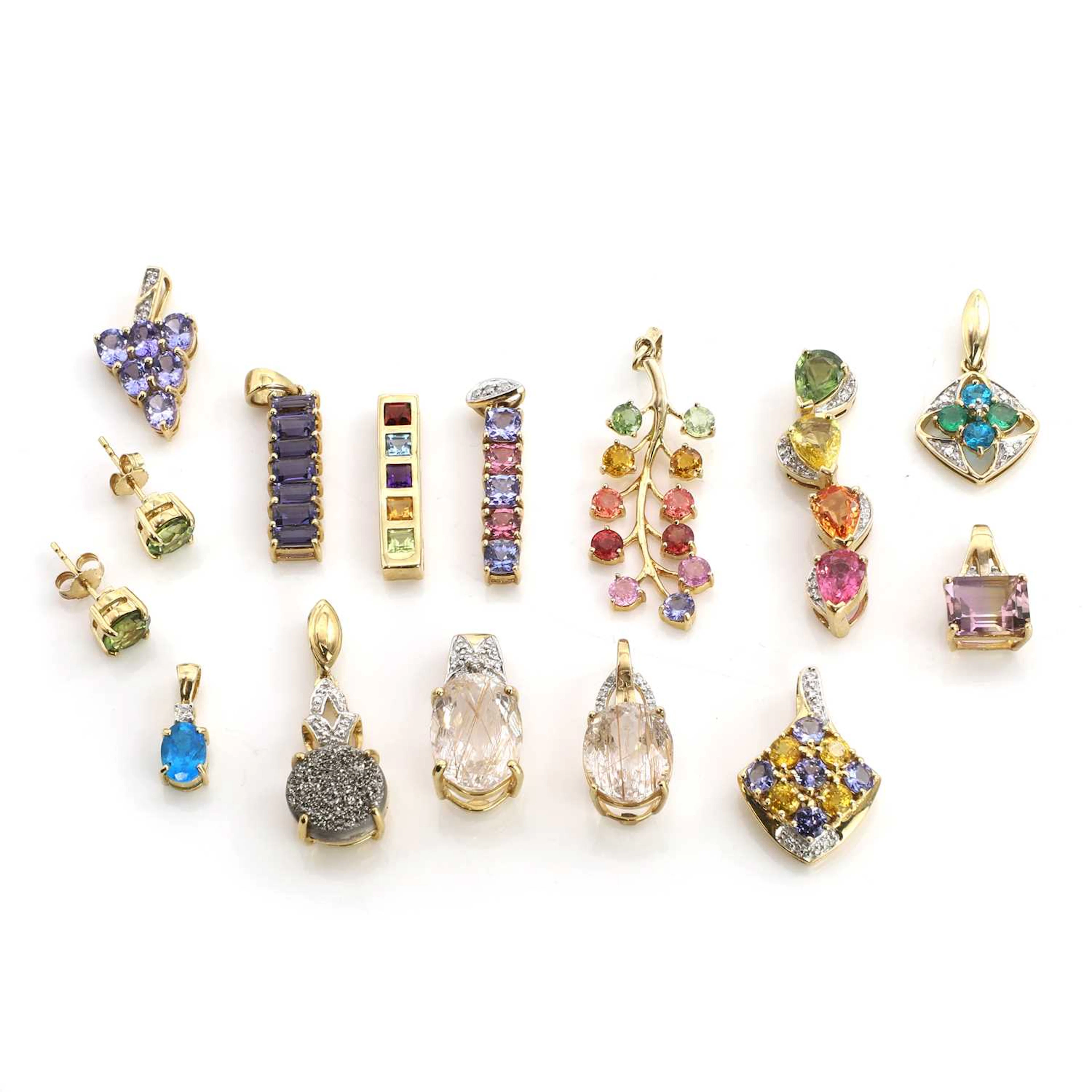 A group of 9ct gold gemstone set pendants and earrings