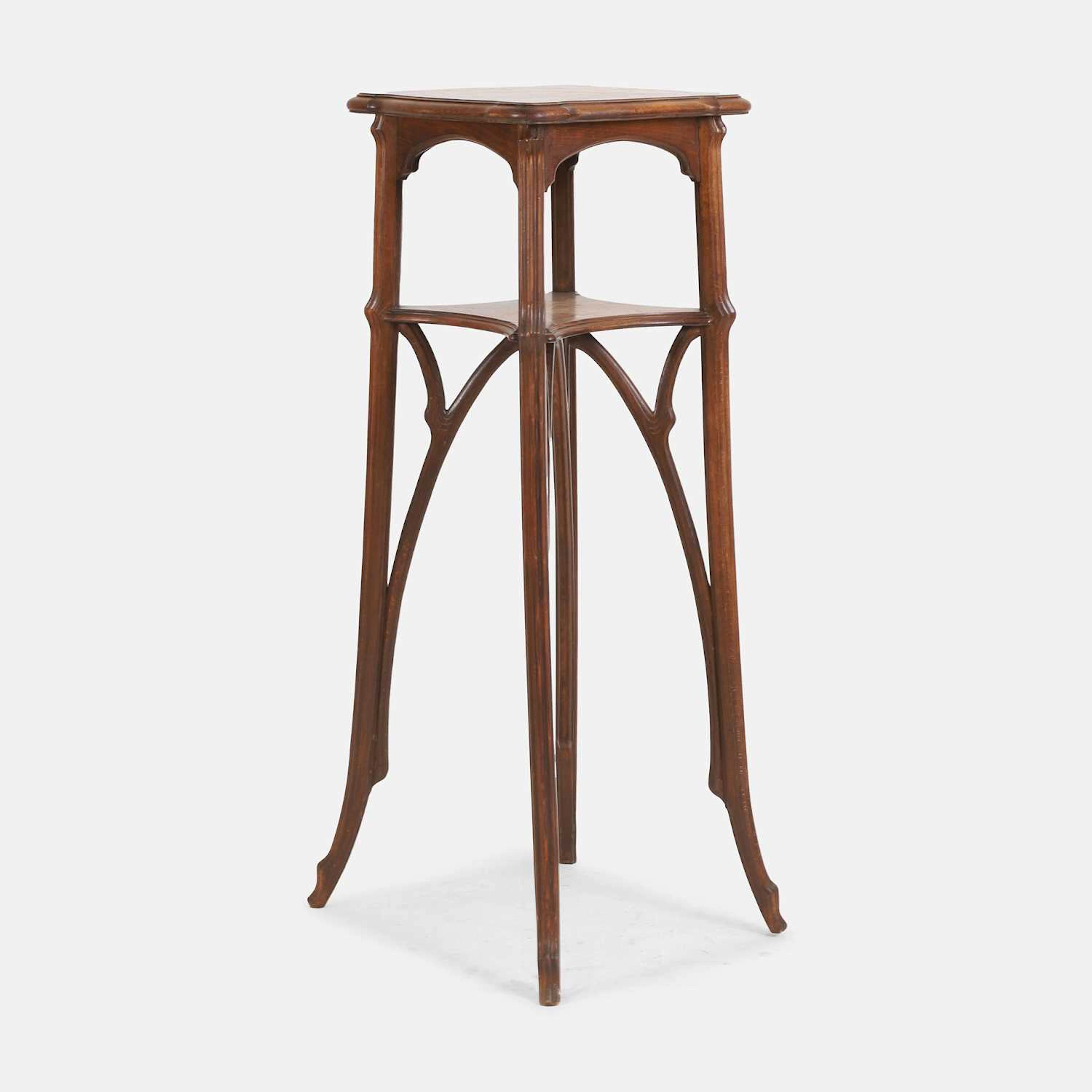 Émile Gallé (French, 1846-1904) a walnut sellette en bois