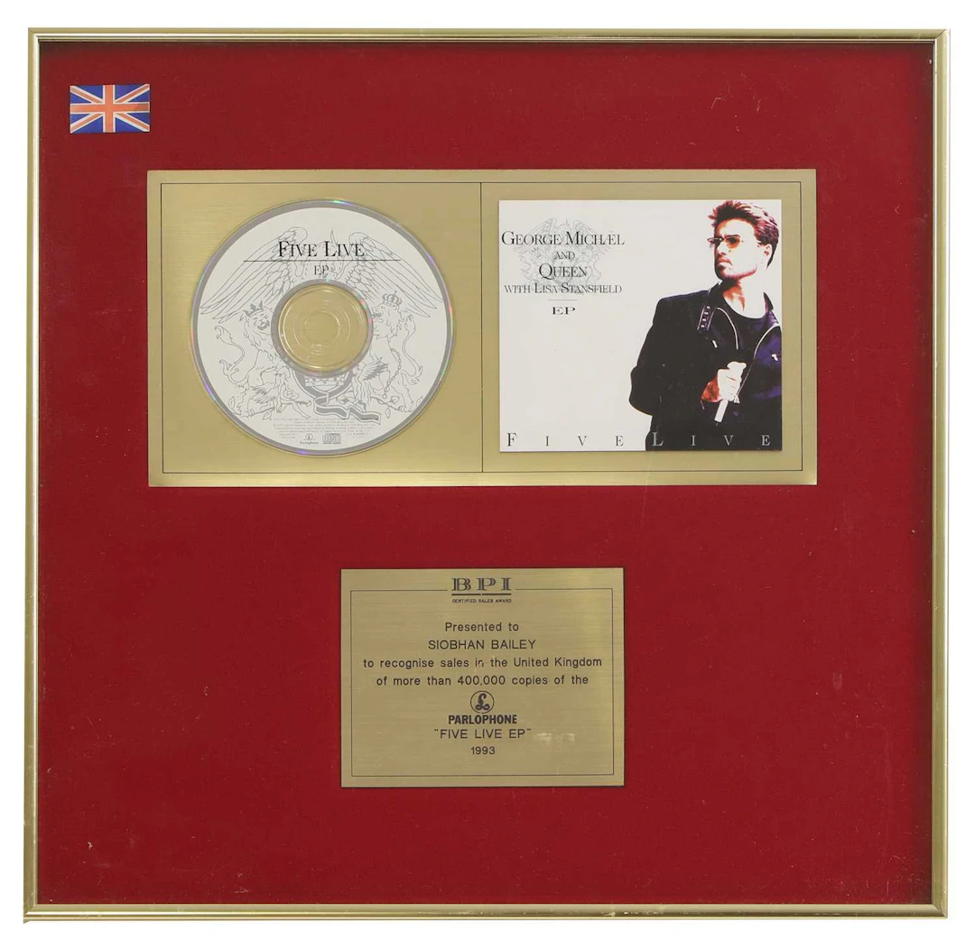 A framed and mounted presentation CD George Michael and Queen with