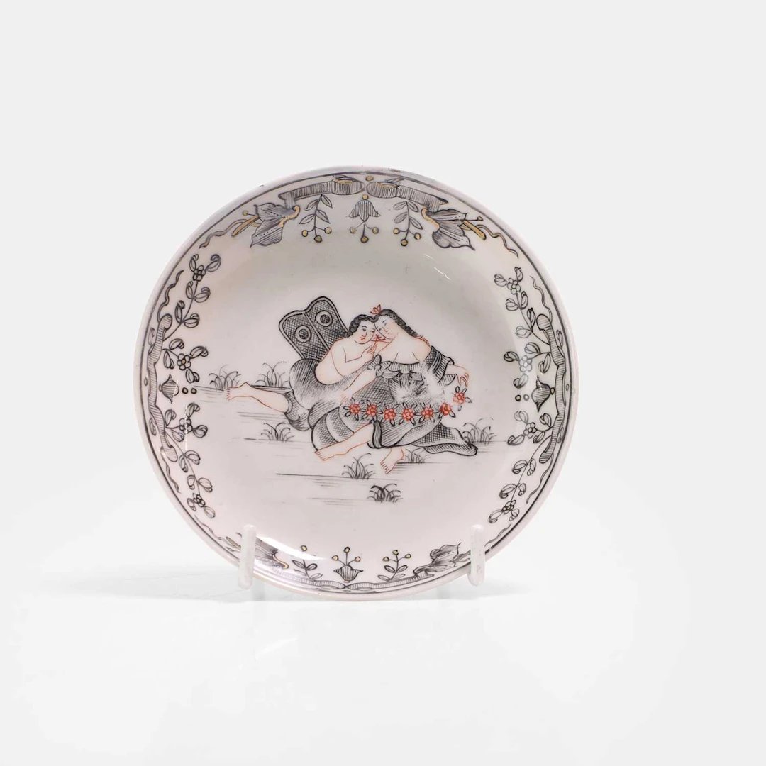 A Chinese export en grisaille-decorated 'mythological subject' saucer