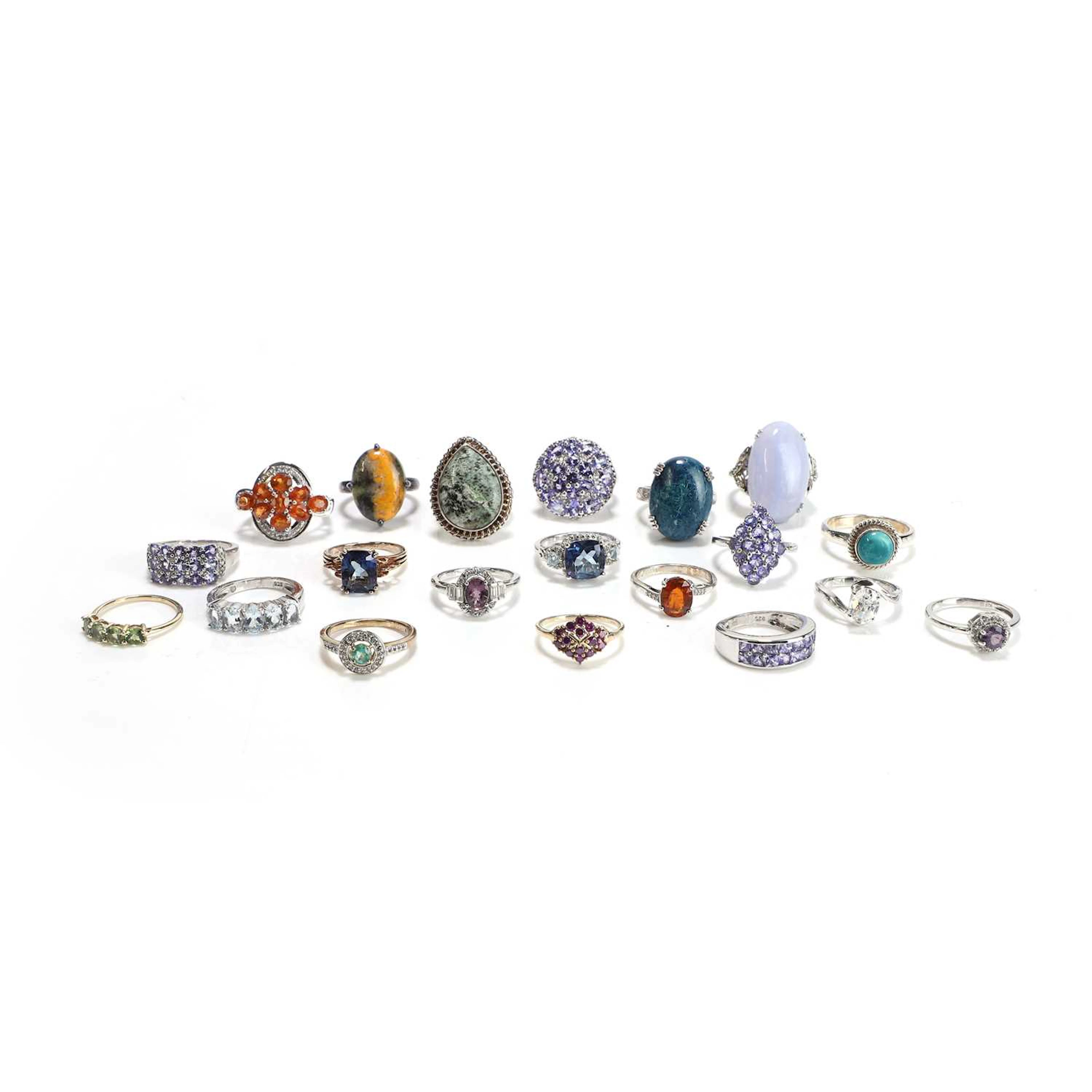 A collection of 9ct gold and silver gemstone set rings