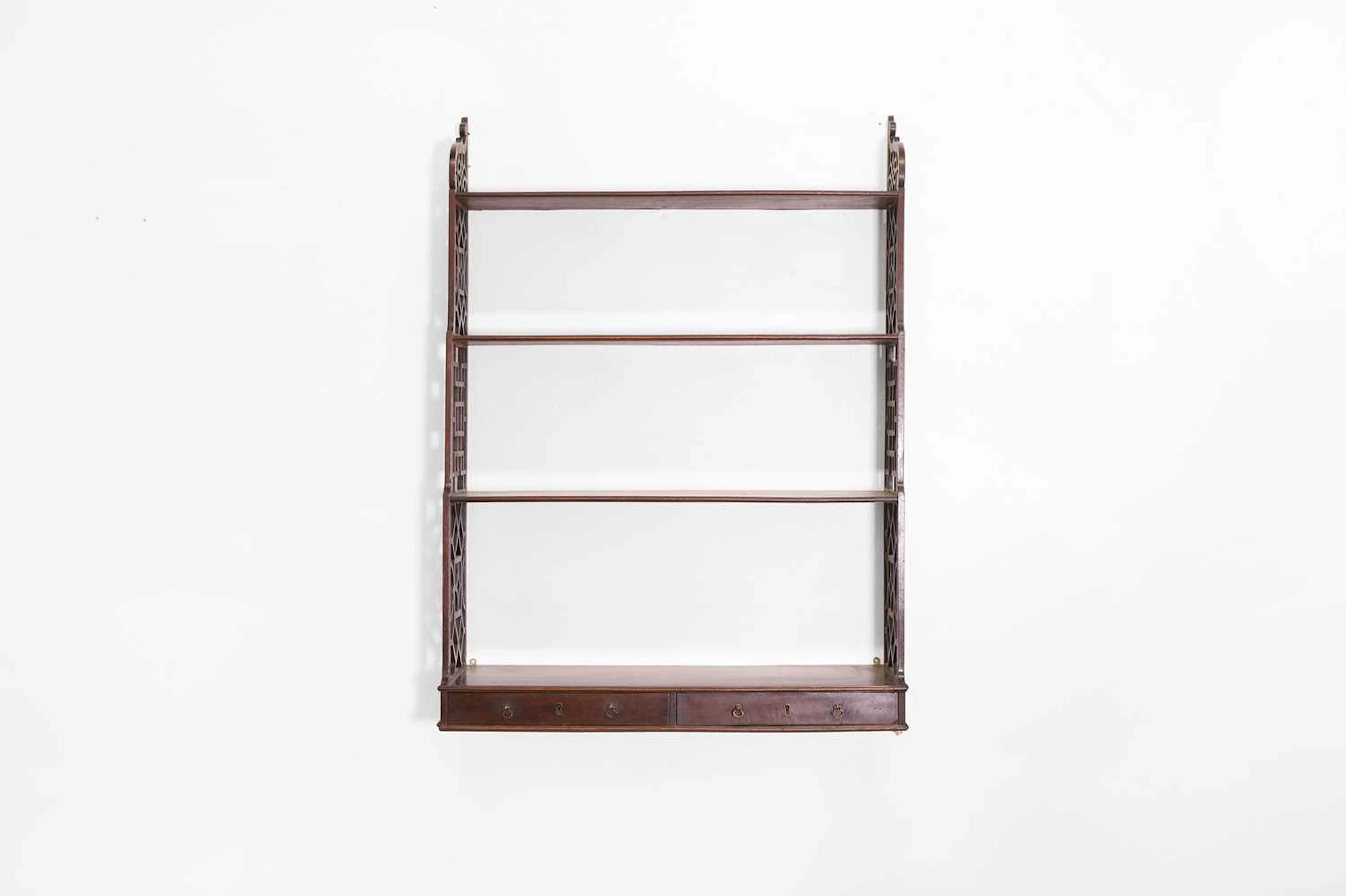 A set of George III mahogany hanging-shelves