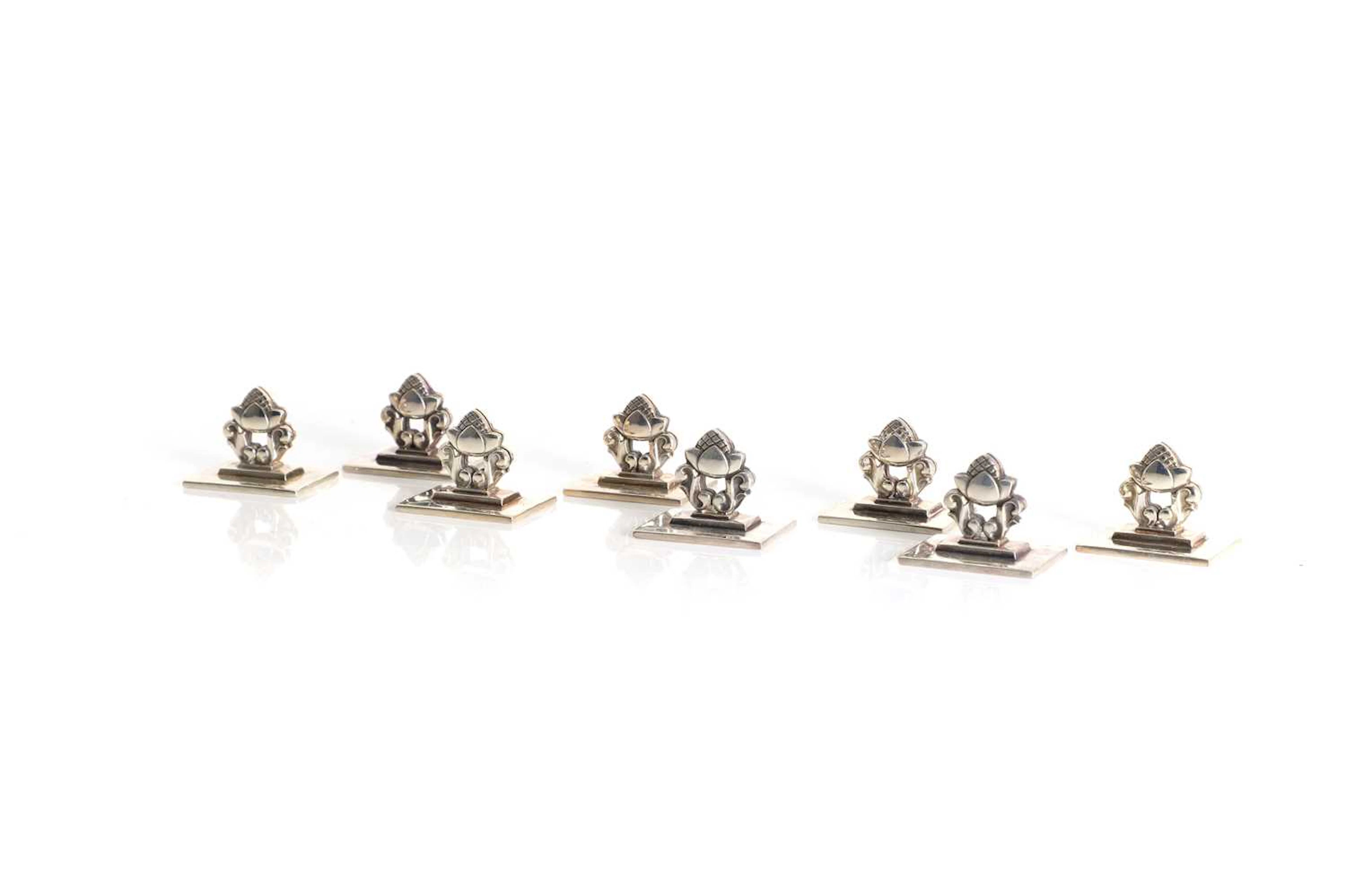 A set of eight Georg Jensen 'Acorn' pattern sterling silver 925 menu