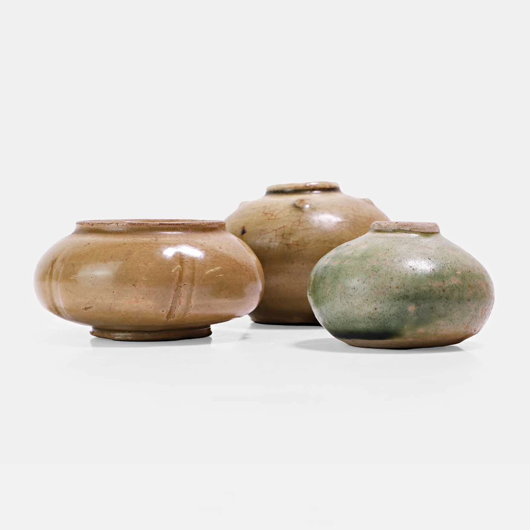 Three Chinese celadon-glazed stoneware jarlets Song dynasty (960-1279)