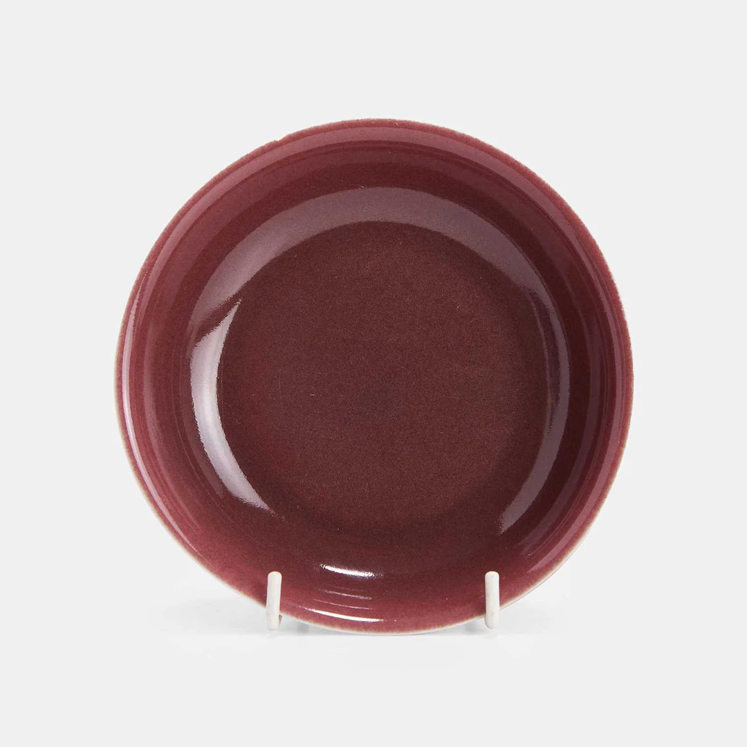 A Chinese sang-de-boeuf glazed dish possibly Ming dynasty