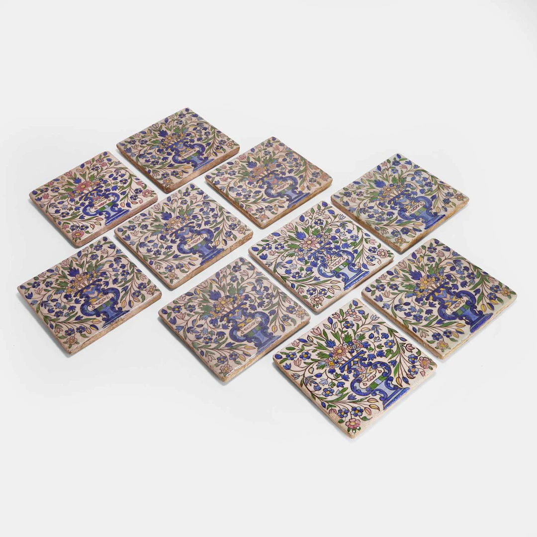 A collection of ten Qajar painted pottery tiles late 19th/early 20th
