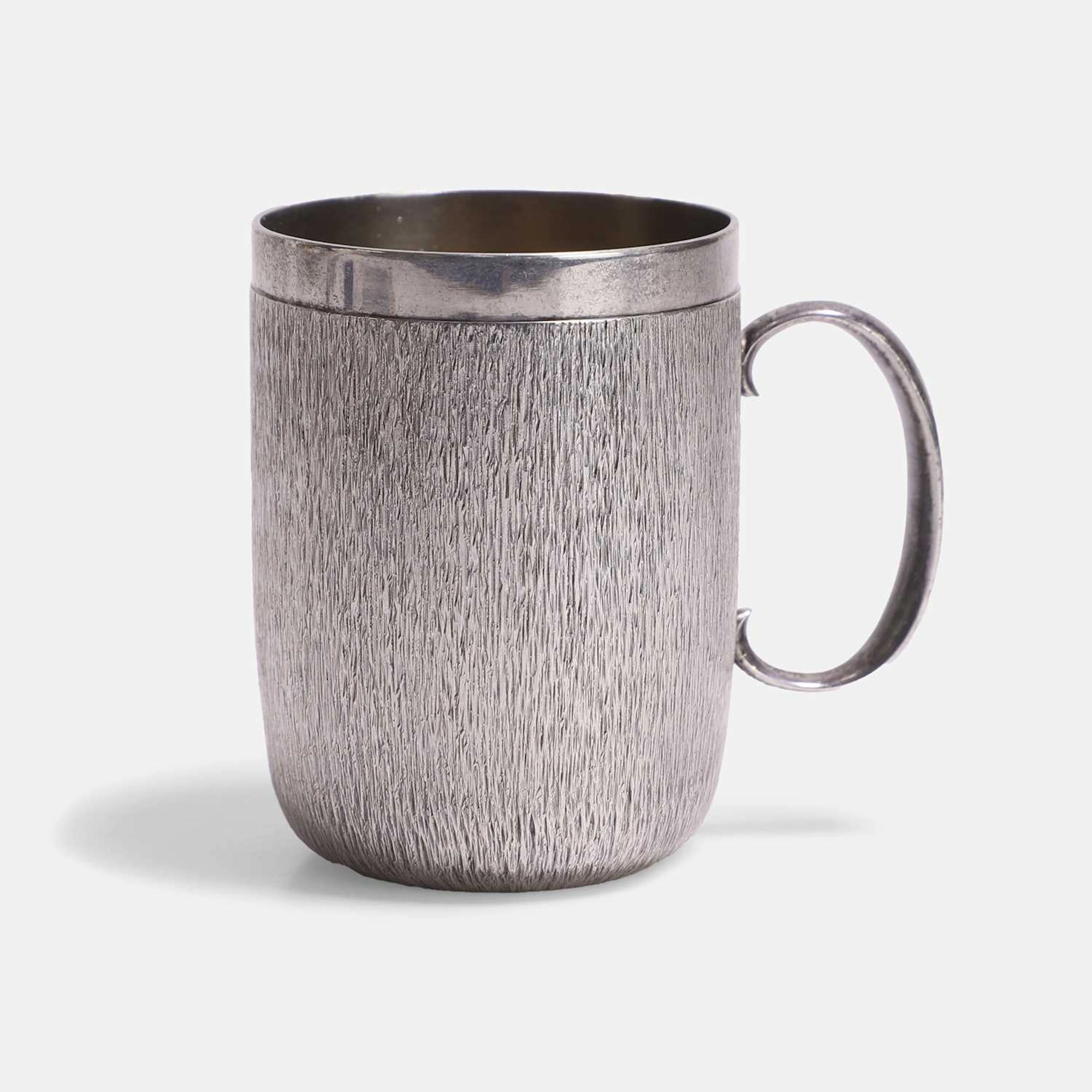 ▲ Christopher Nigel Lawrence (British, b.1936) a silver and silver-gilt mug