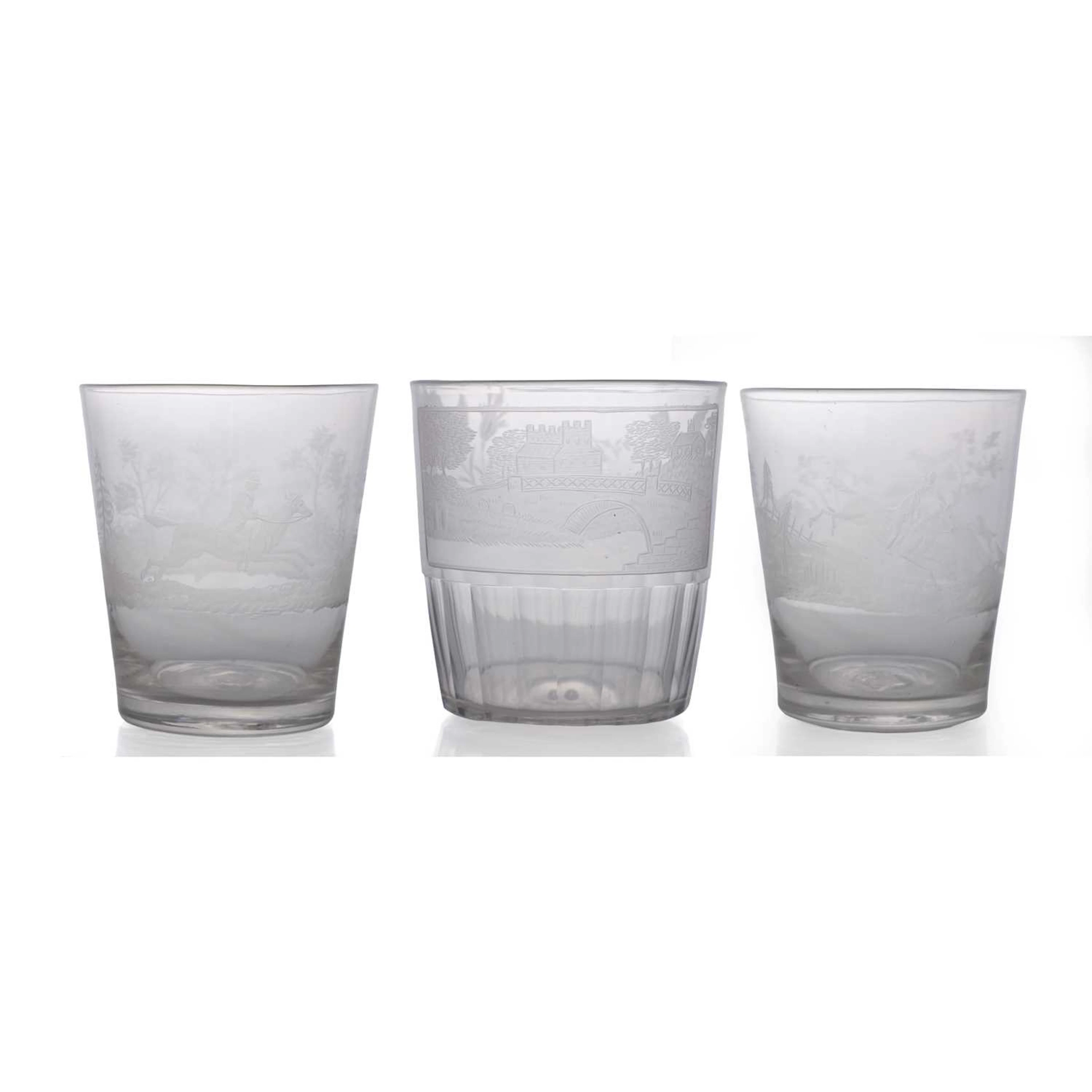 A group of three engraved glass tumblers early 19th century