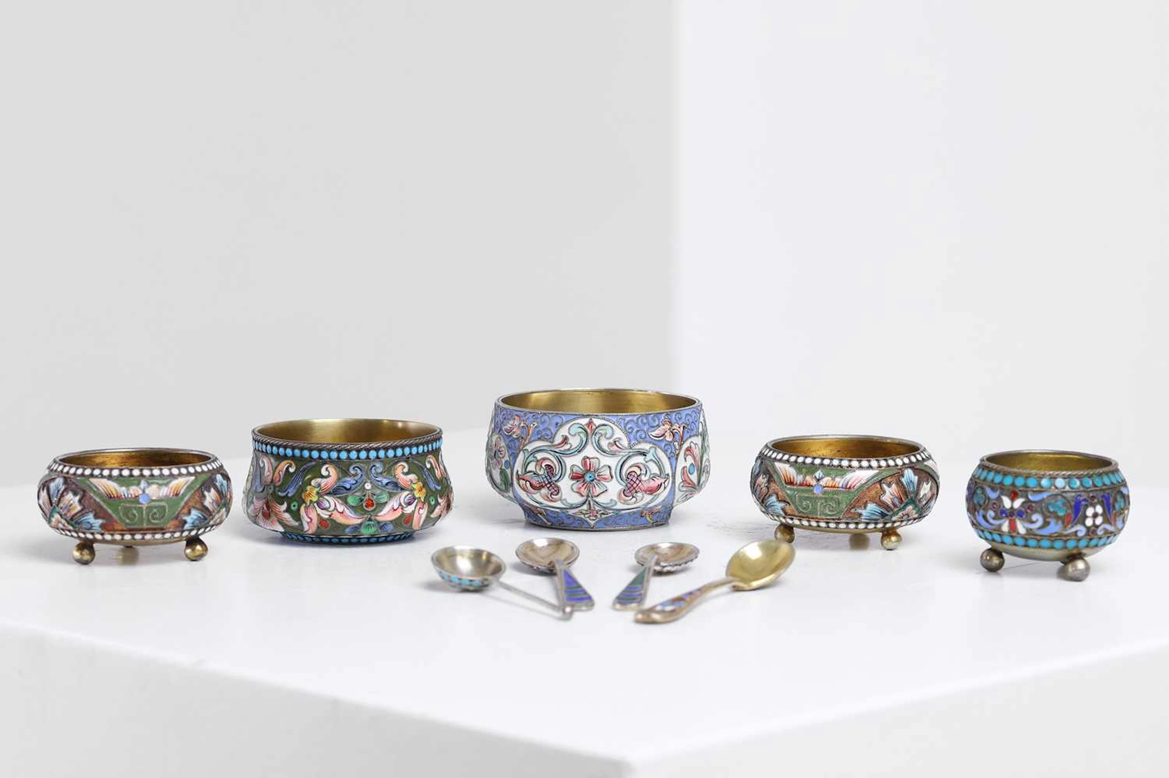 A group of silver-gilt and cloisonné salt cellars