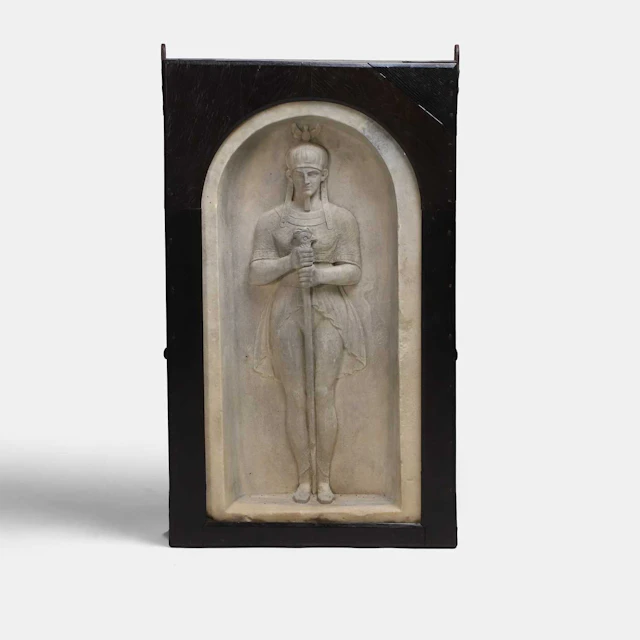 An intriguing Egyptianesque marble niche carving probably 19th century