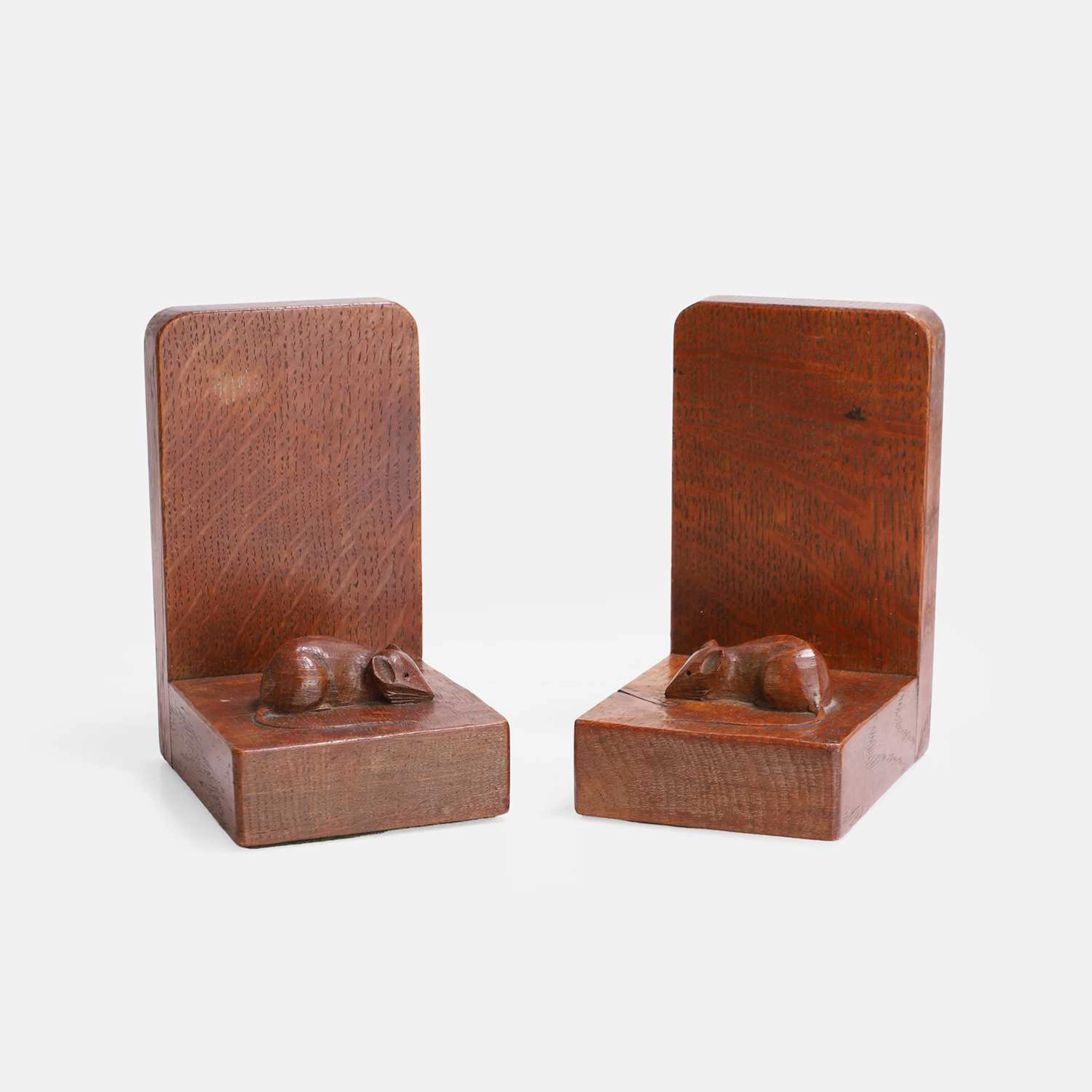 Robert 'Mouseman' Thompson (British, 1876-1955) a pair of oak bookends