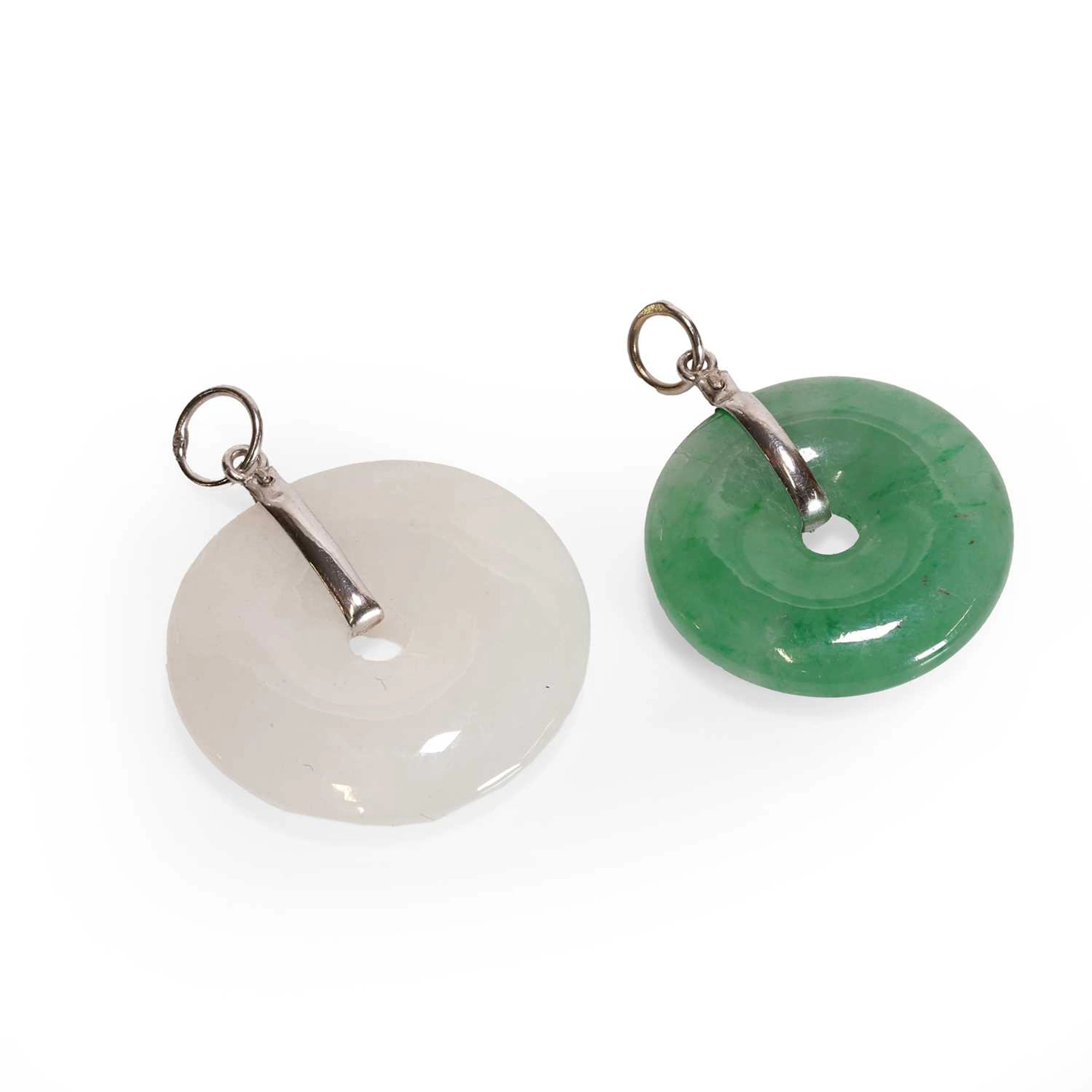 Two jade bi disc pendants