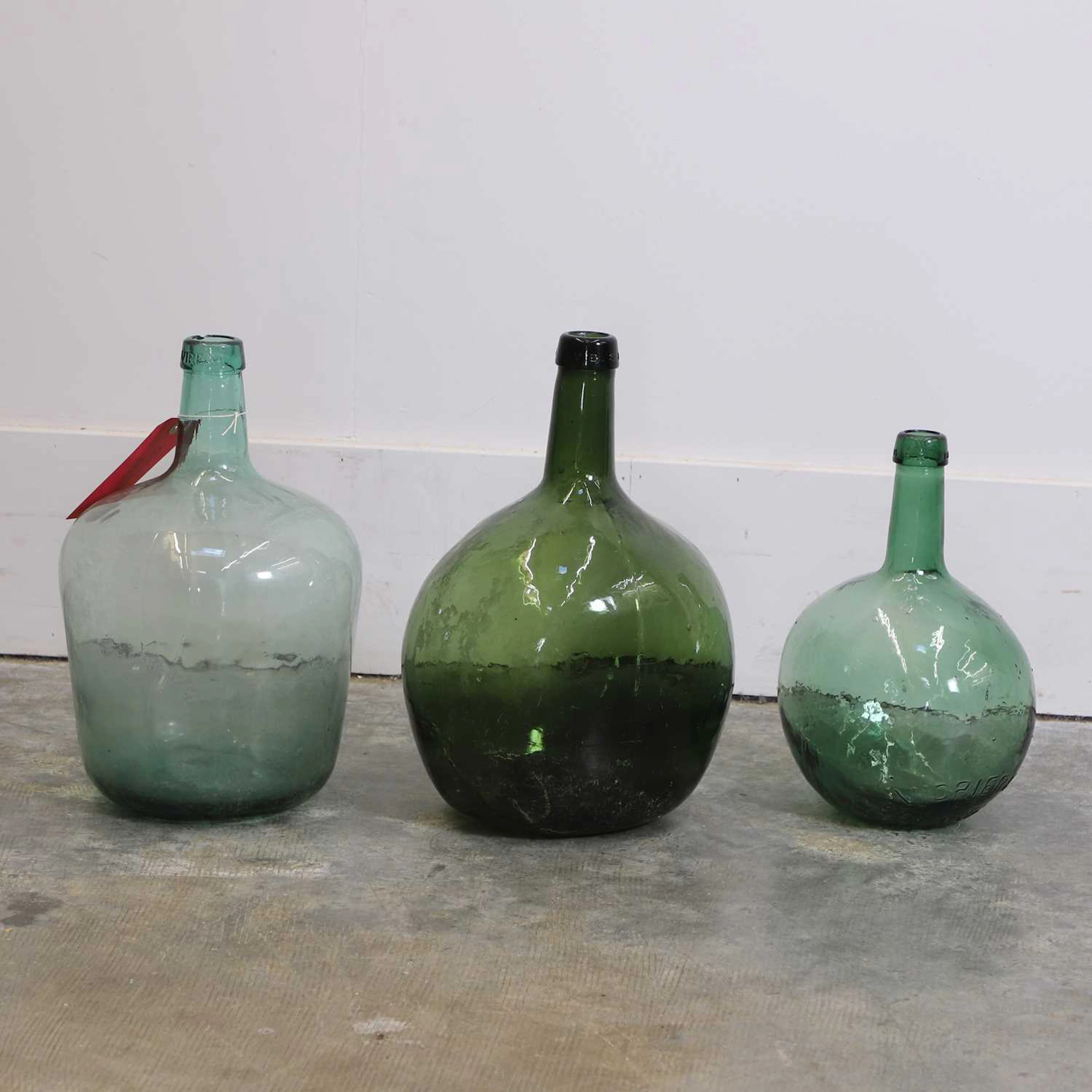 A collection of three demijohns 20th century, Spanish