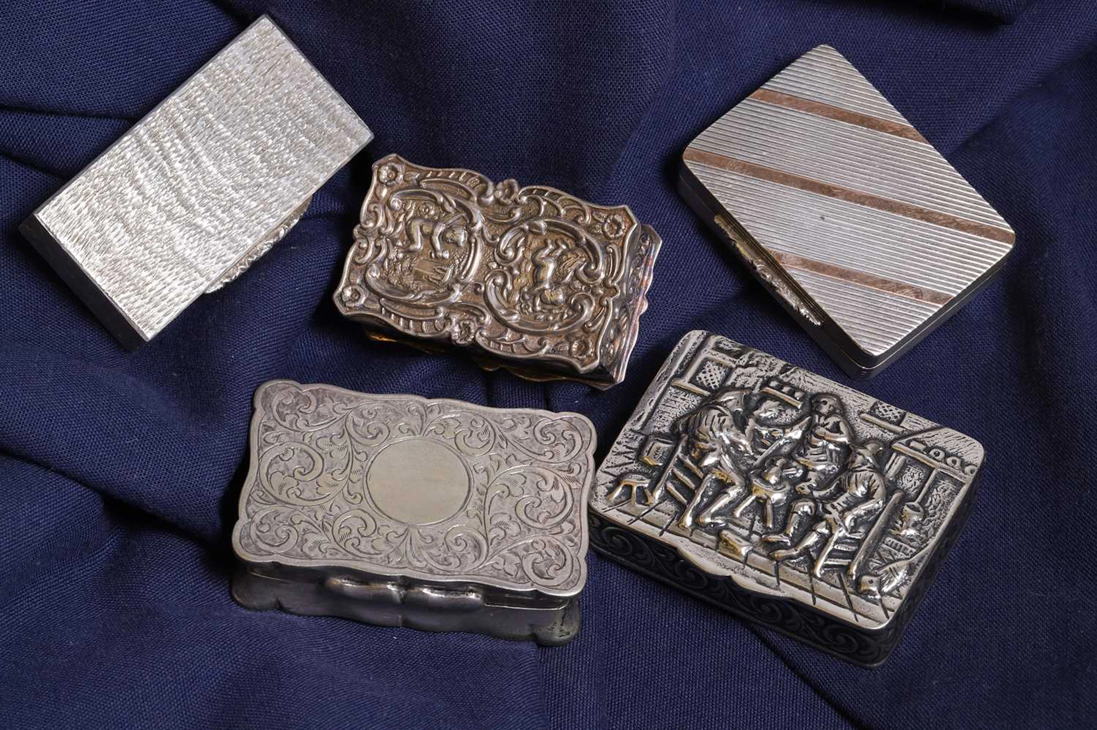 A silver 'Castle Top' vinaigrette and a group of five silver snuff boxes