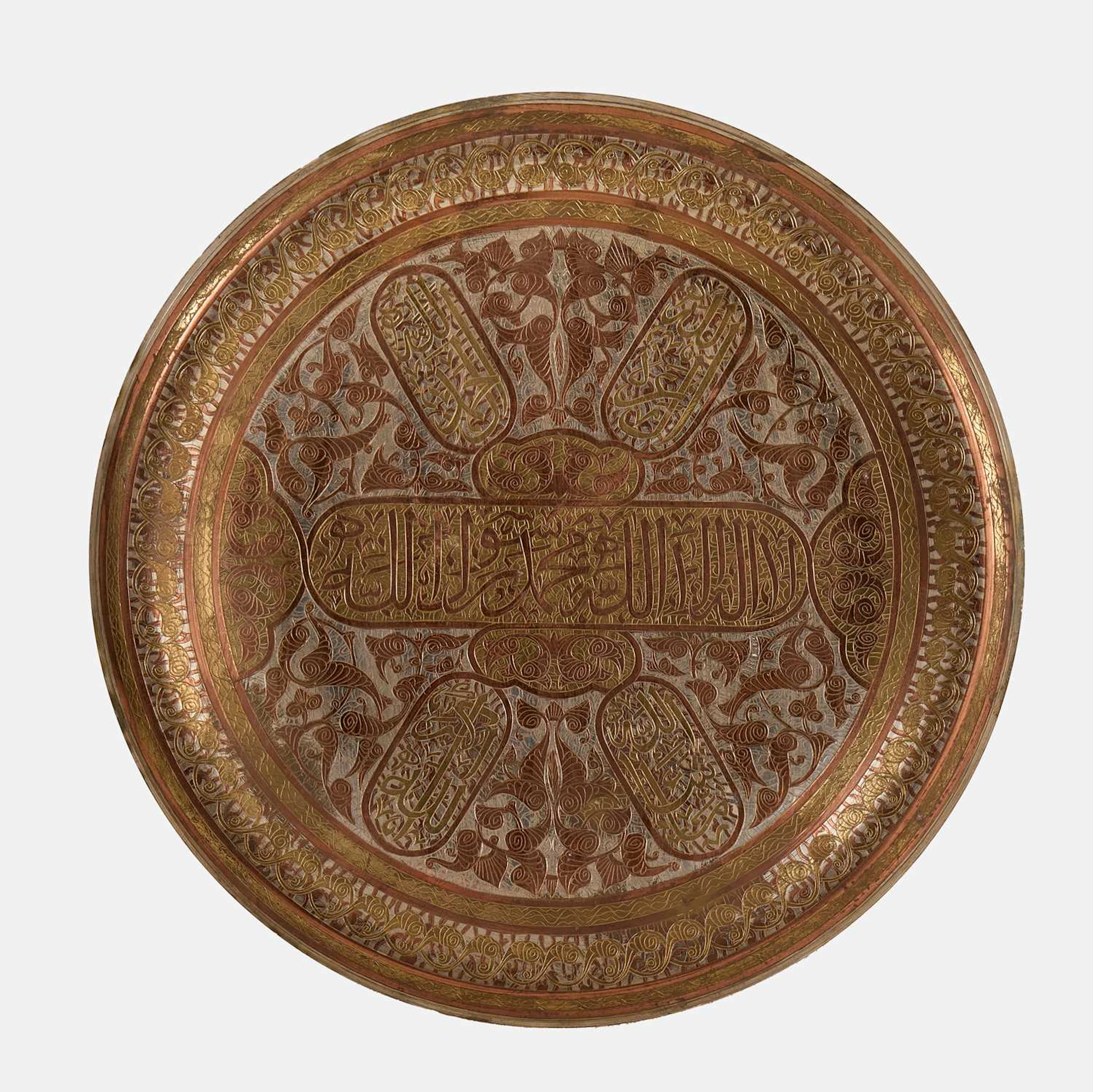A Mamluk Revival brass and copper tray late 19th century/early 20th